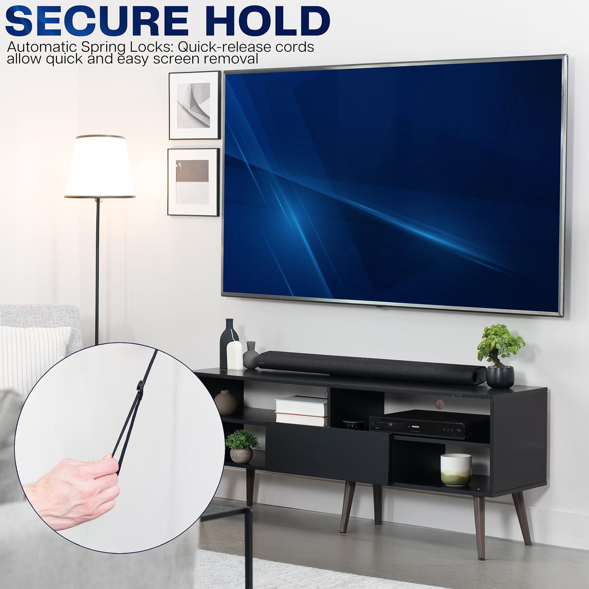 TV mounted on a wall with a close-up of a quick-release cord, set in a living room.