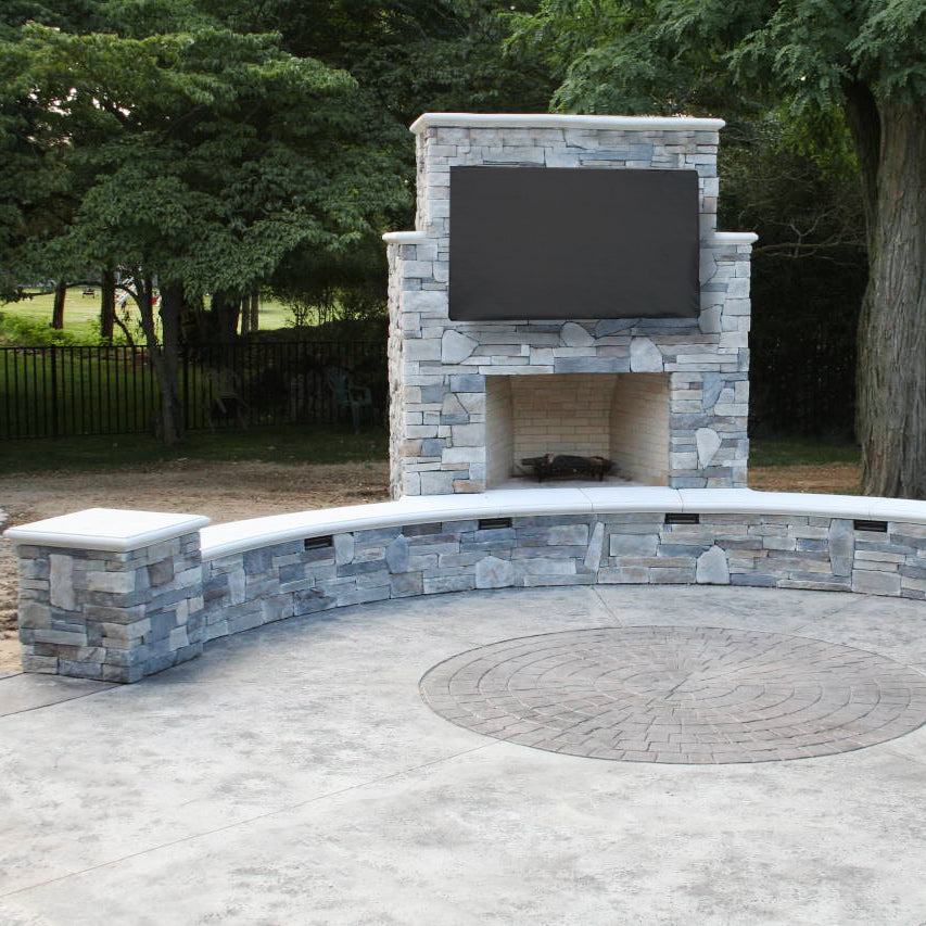 Protective flat screen TV cover in an outdoor patio area.