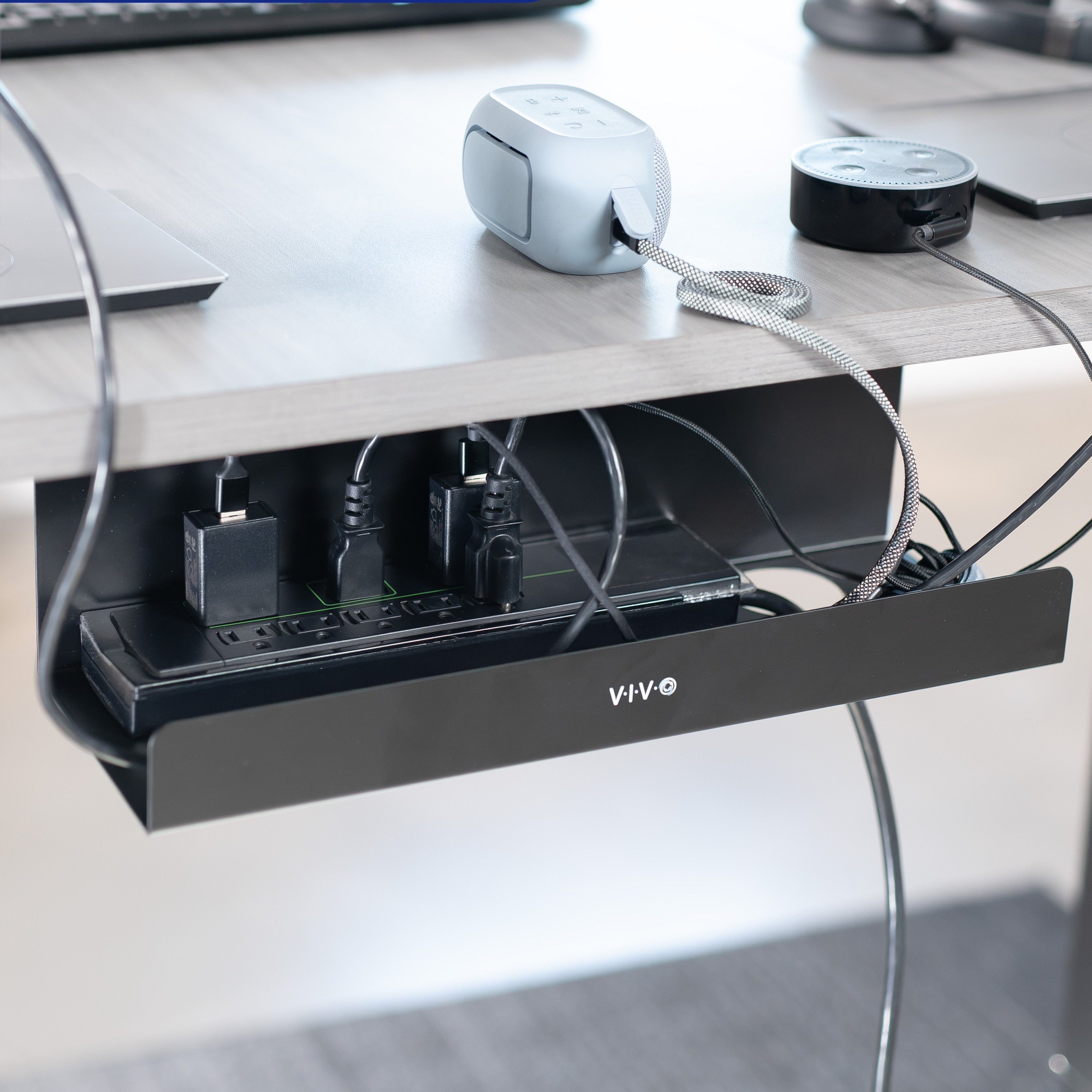 Extra deep under desk cable management tray for office storage. Low profile, sleek, and flexible with simple installation.