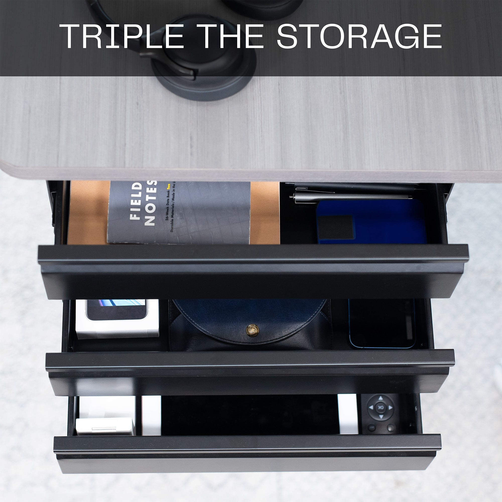 Sleek under desk storage unit with three pull-out drawers for office workstation organization.