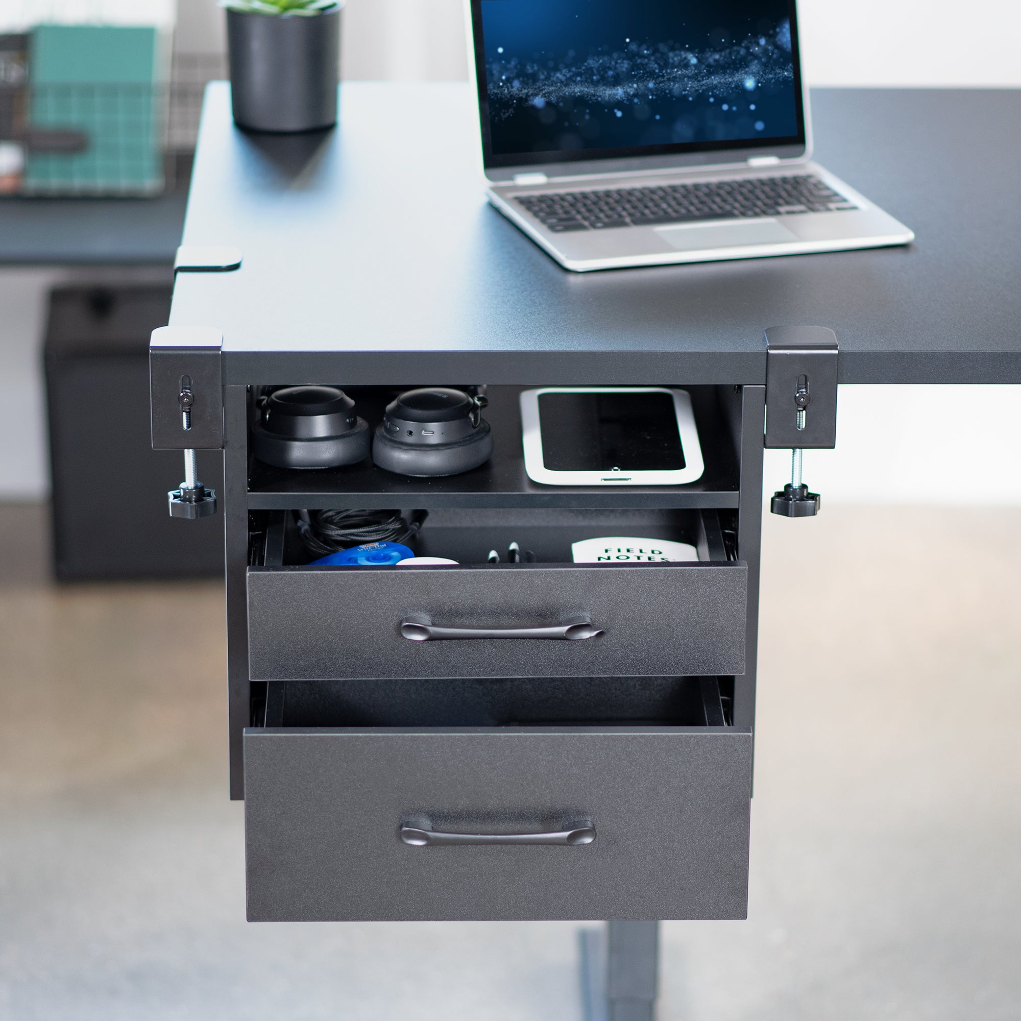Clamp-on corner desk storage system with two pull-out drawers and open top shelf surface.