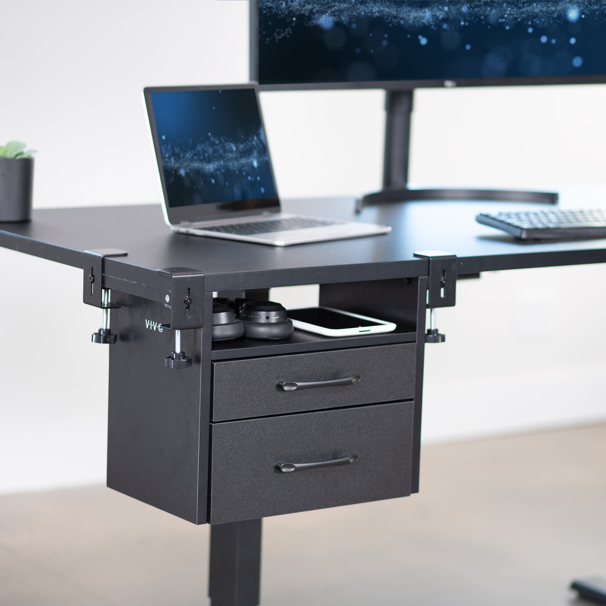 Clamp-on corner desk storage system with two pull-out drawers and open top shelf surface.