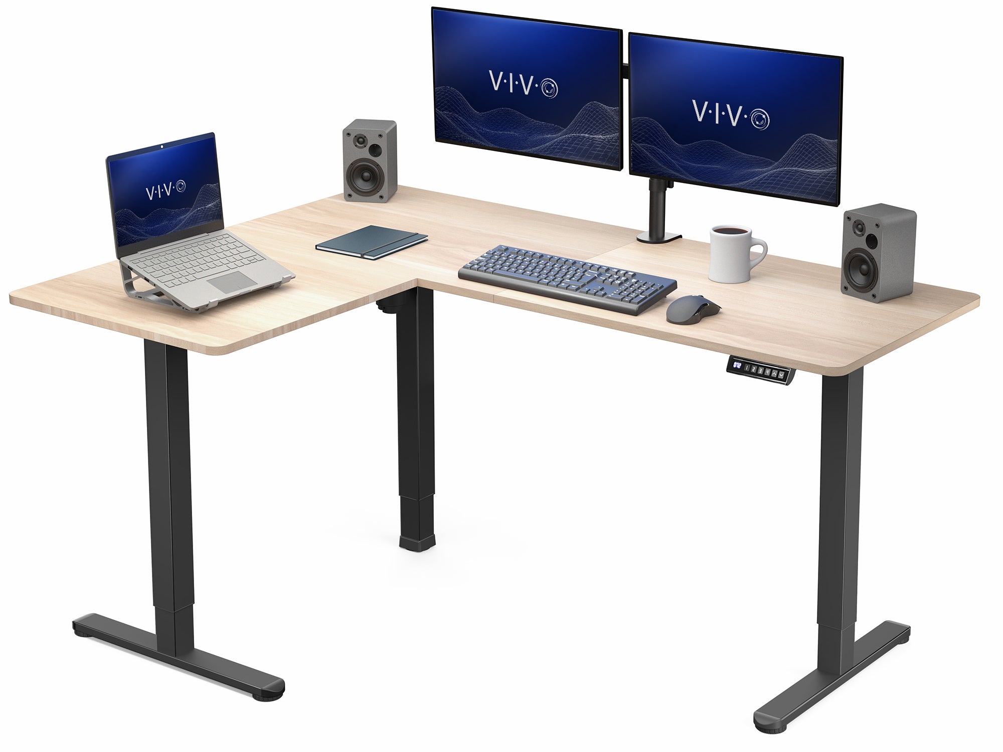 L-shaped desk with computer setup including two monitors, a laptop, keyboard, and speakers on a white background.