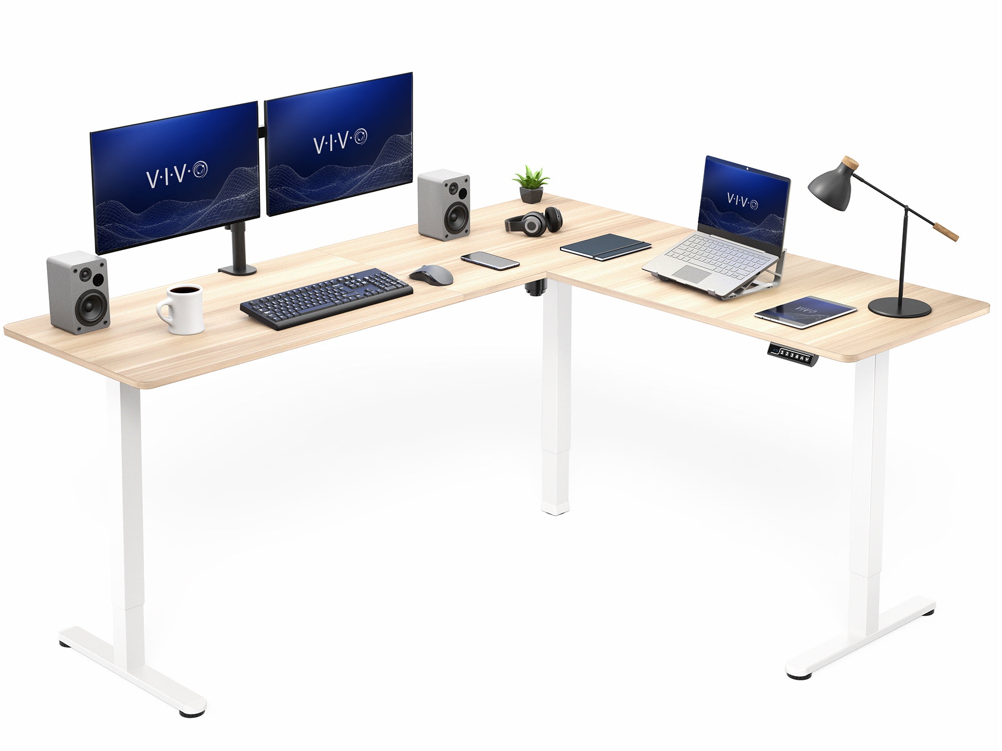 Wooden L-shaped desk with computer setup on a white background