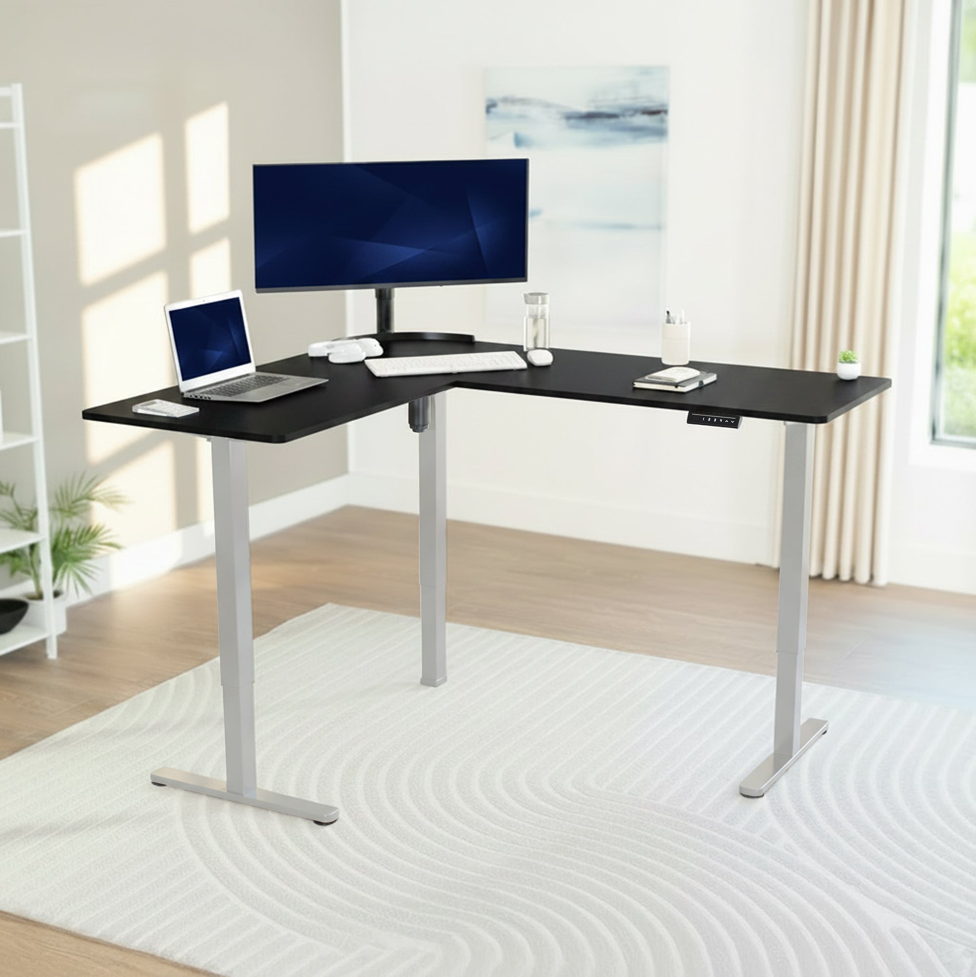 Modern L-shaped desk with computer setup in a bright room