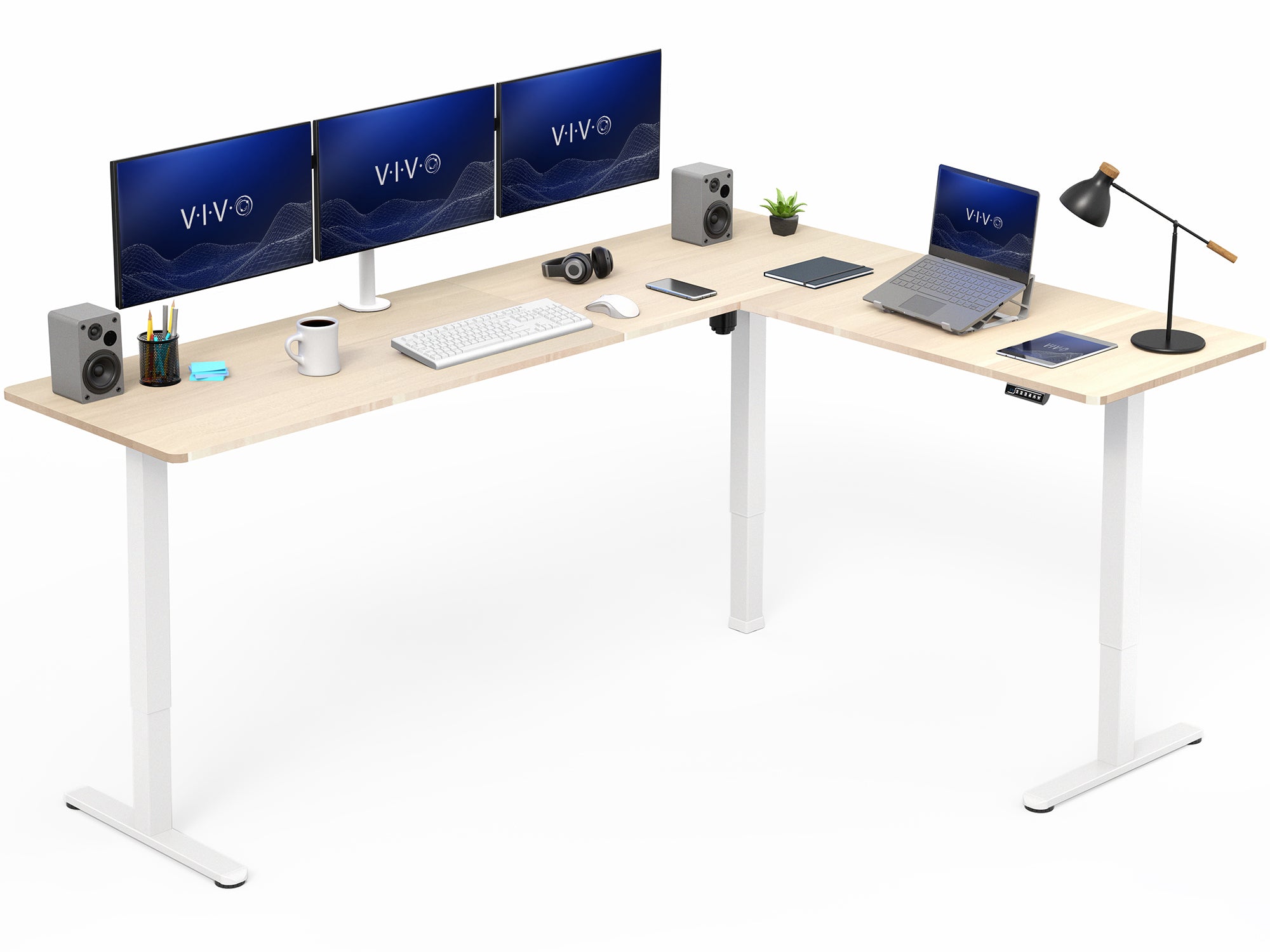 L-shaped desk with computer setup including monitors, keyboard, and laptop on a white background