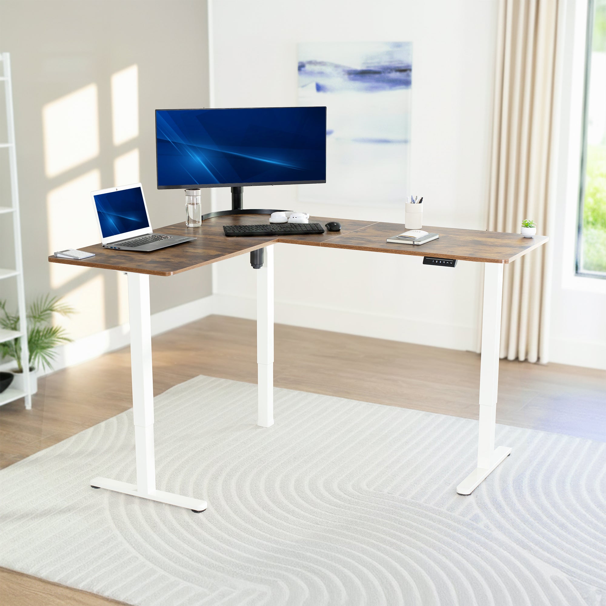 Modern L-shaped desk with computer setup in a bright room