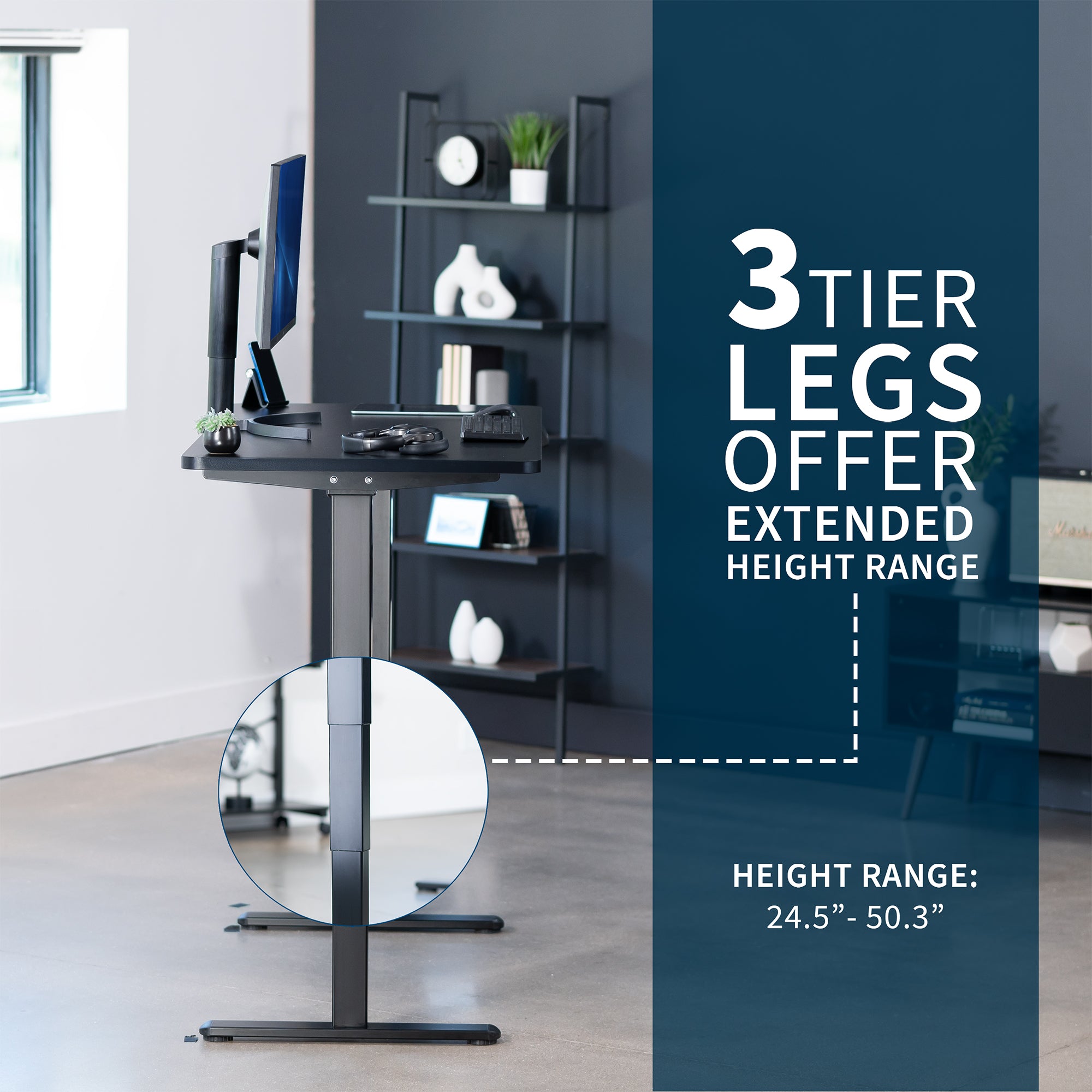 Black adjustable desk with a 3-tier leg design in an office setting