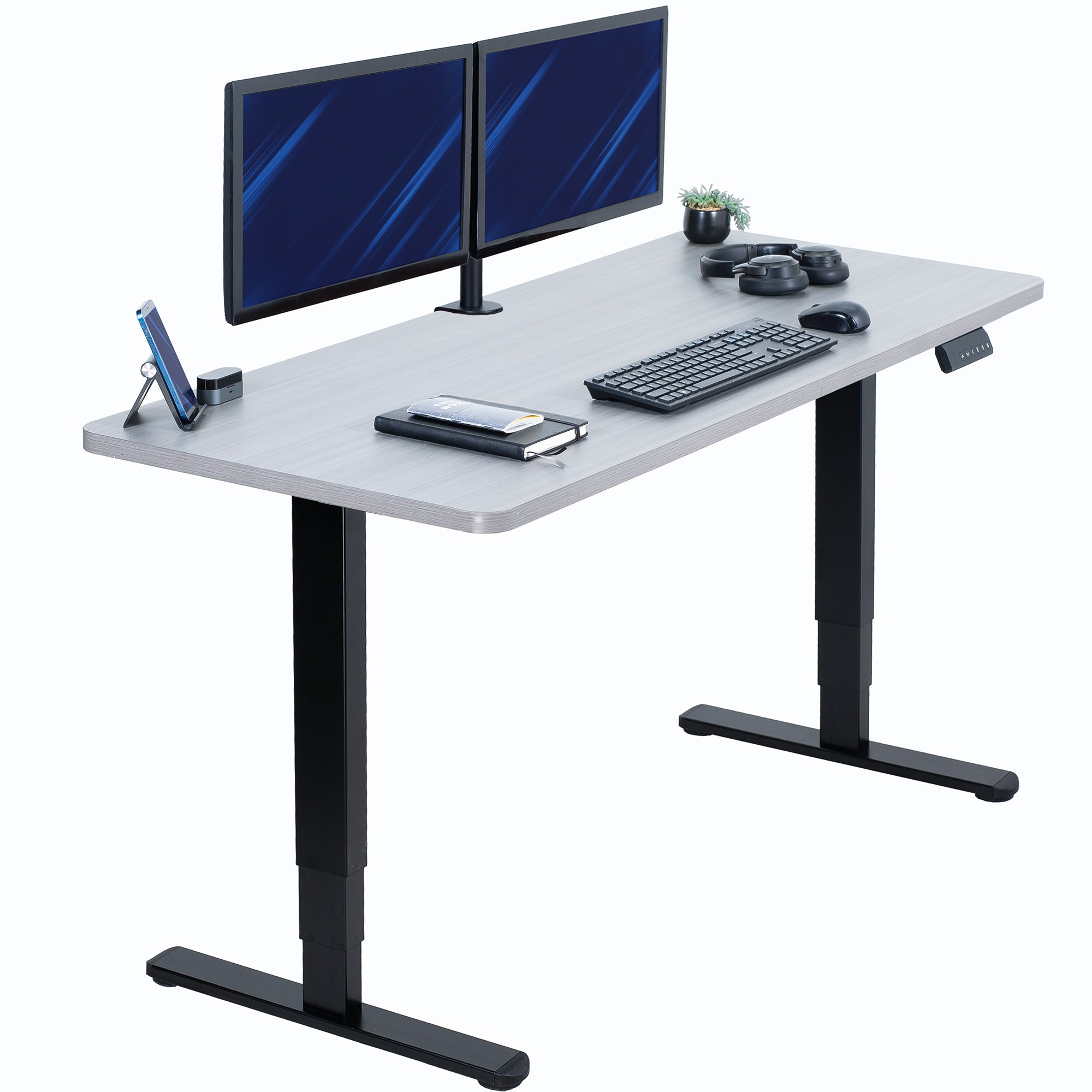 Gray desk with black legs, two monitors, keyboard, and mouse on a white background