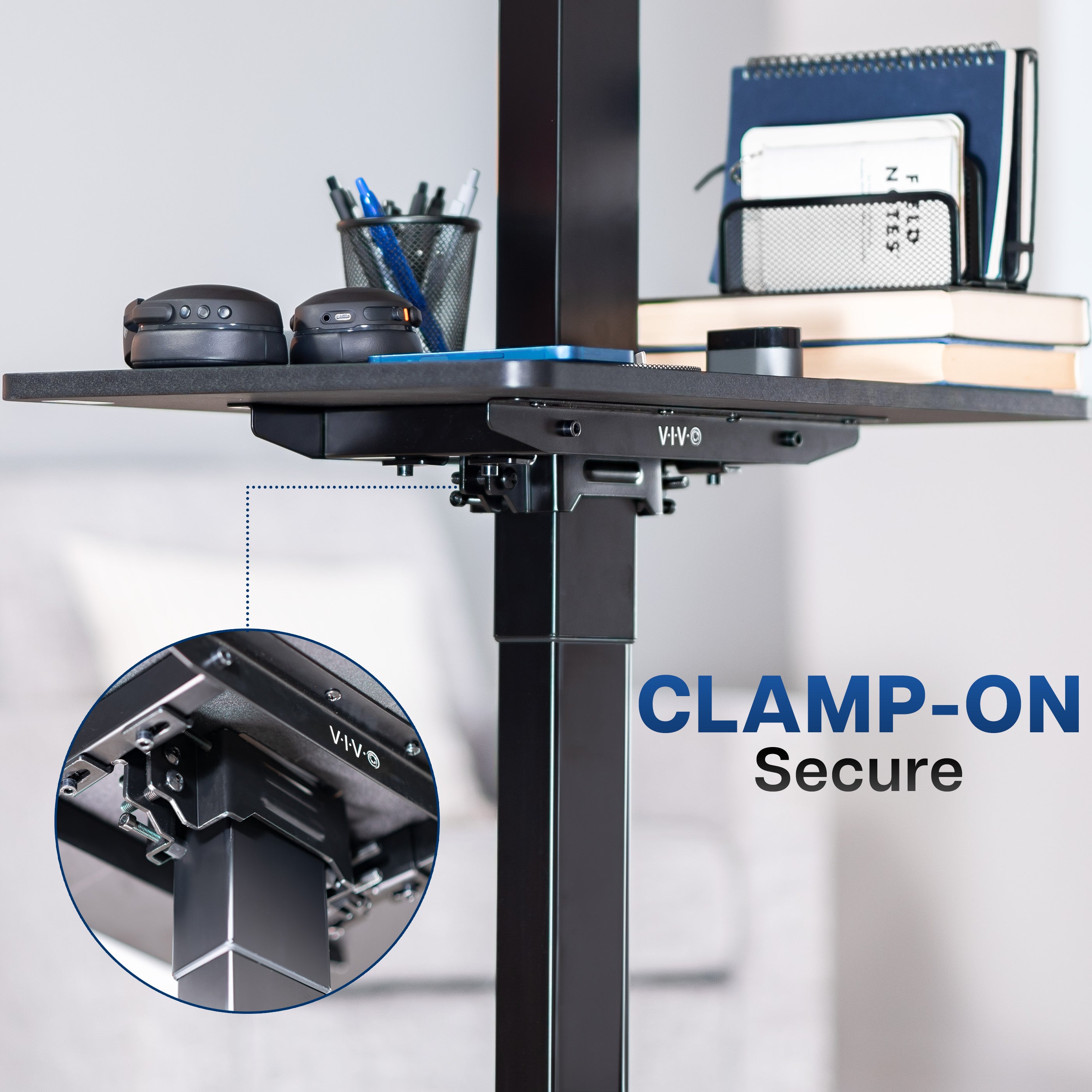 Under desk floating shelf platform that clamps onto desk leg. Provides convenient hidden storage that adjusts with your sit to stand desk.