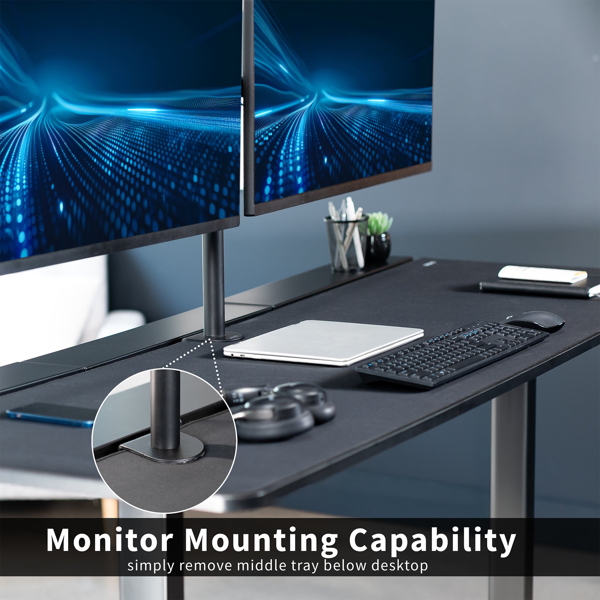 Desk setup with dual monitors, keyboard, and mouse on a dark surface.
