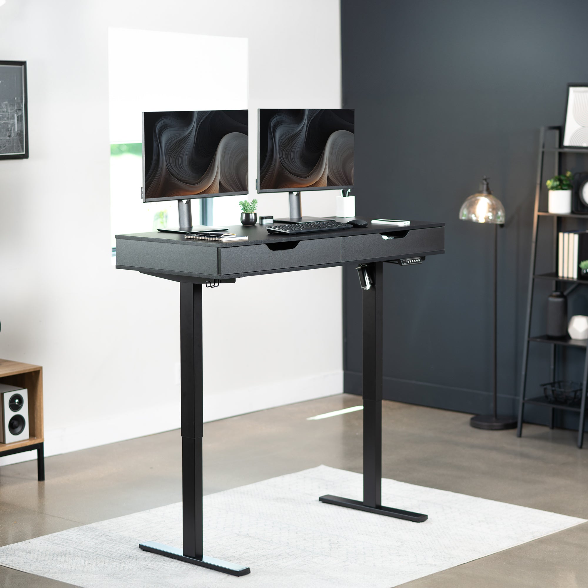 Black shelf with a drawer in a modern office.