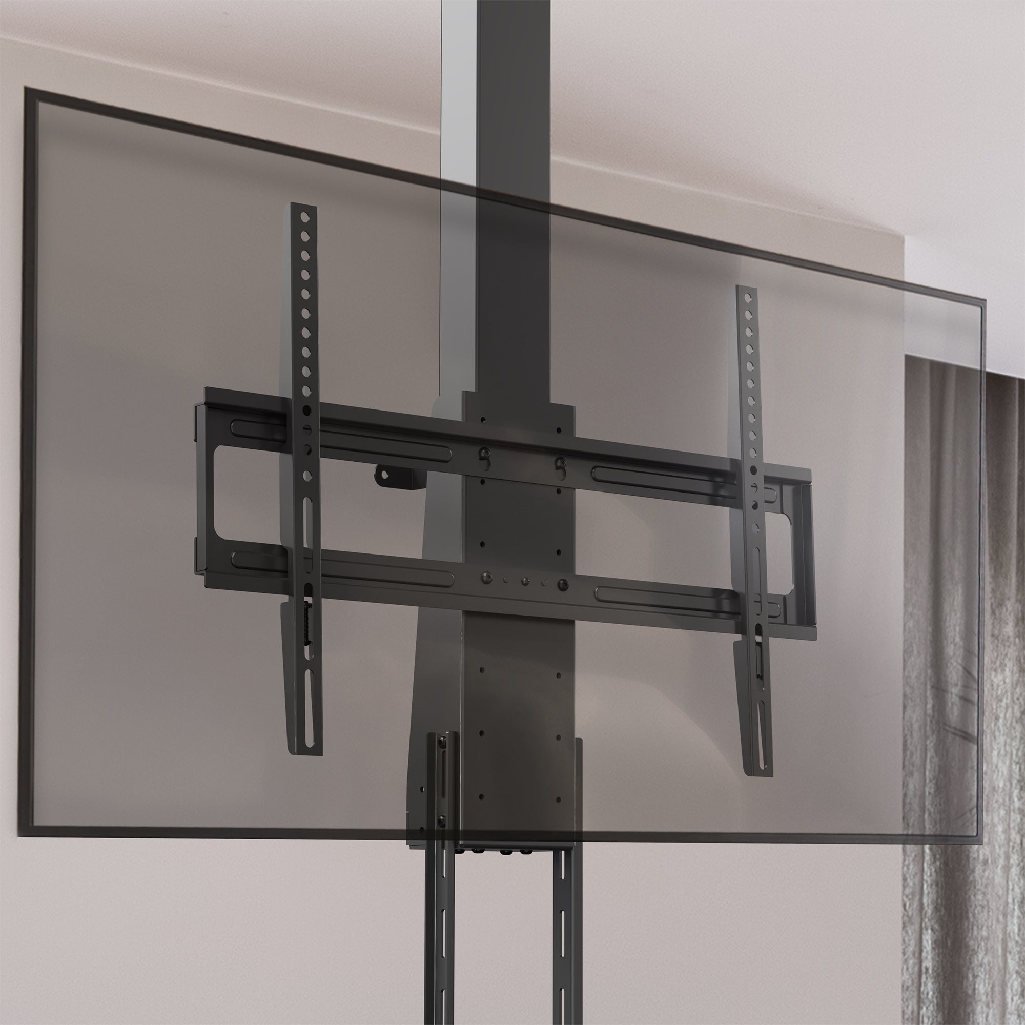 A motorized large TV mount with remote control, showing a flat panel TV attached to a ceiling mount with an extension pole.