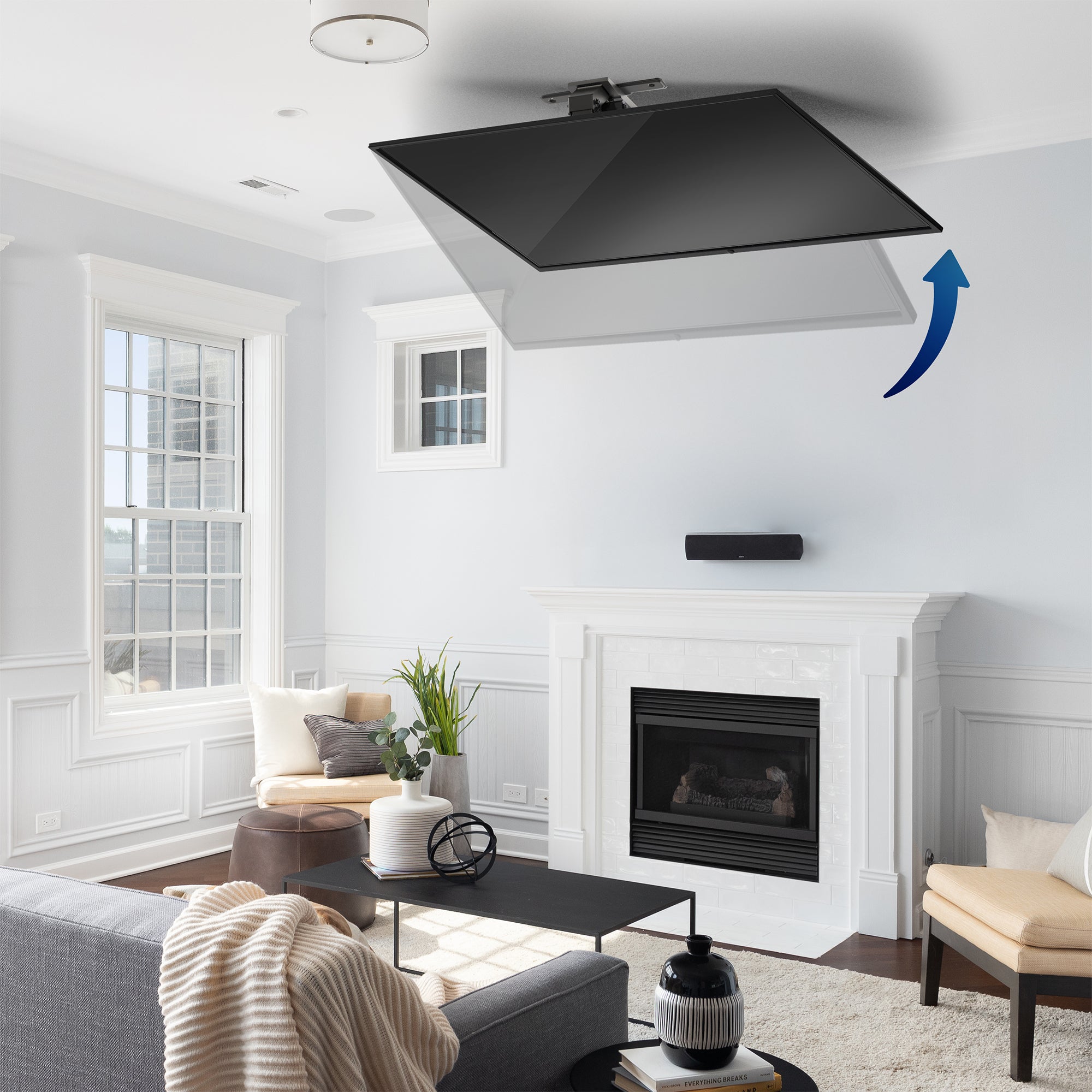 Electric Flip Down Ceiling TV Mount in living room.