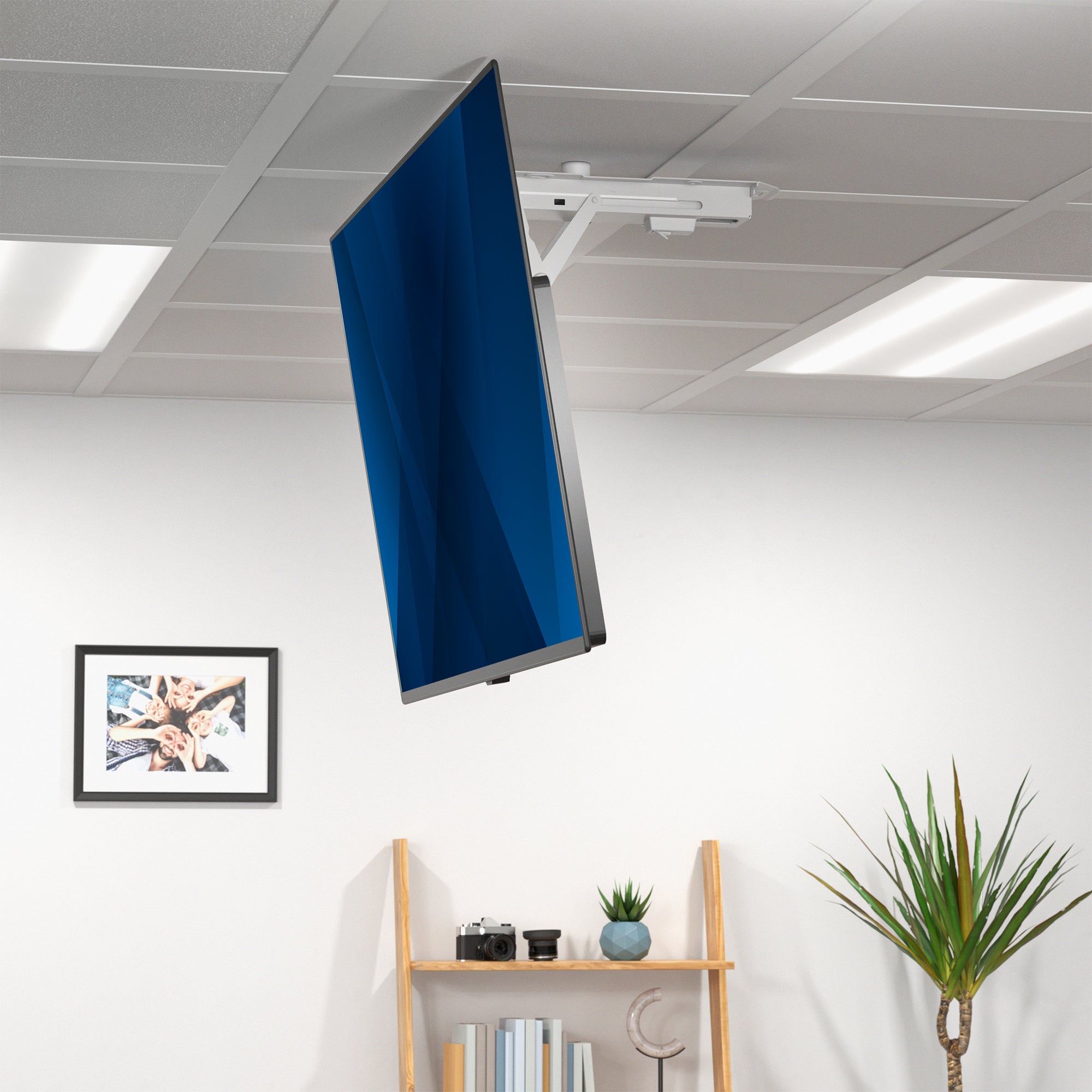 Flat-screen TV mounted in office or home space.