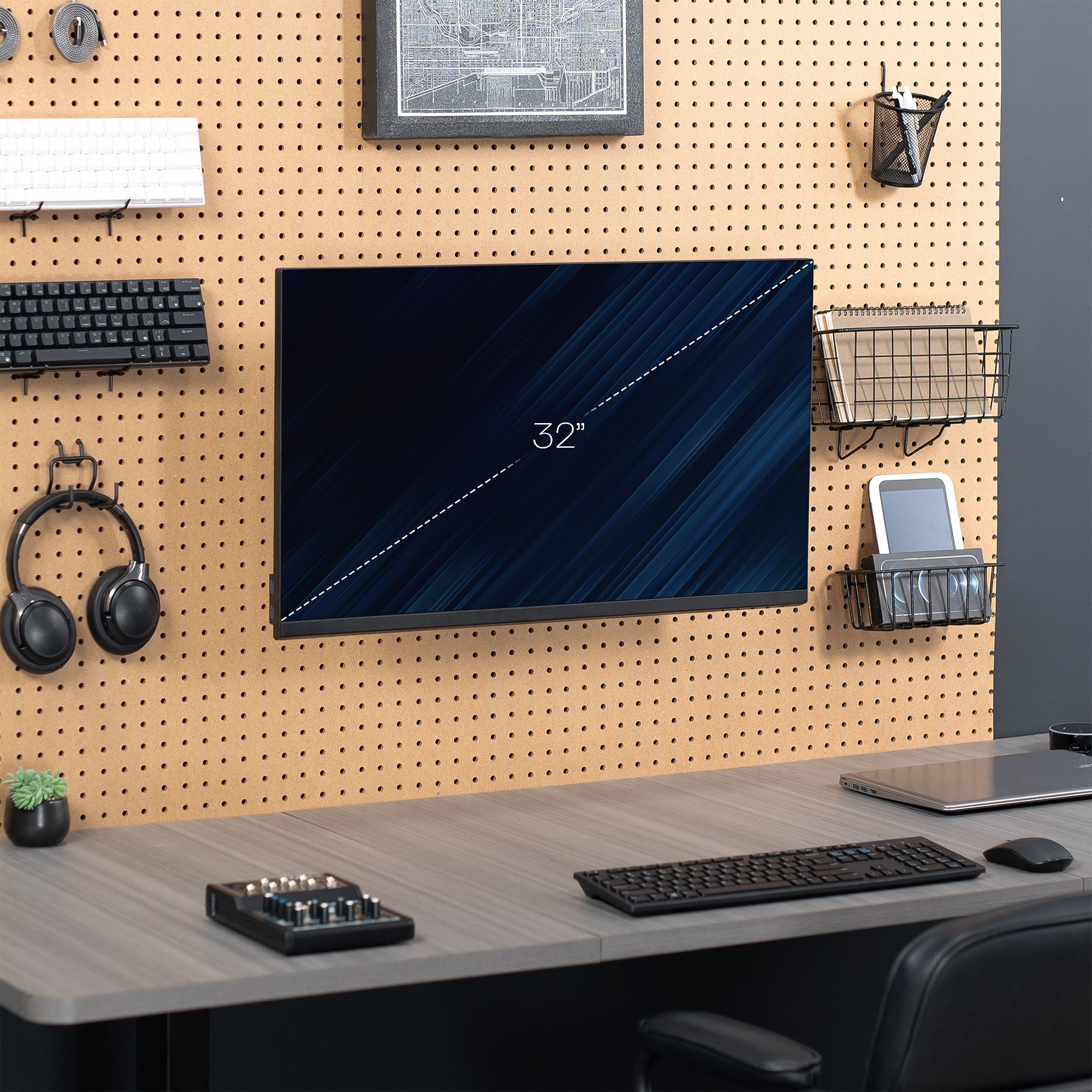 Pegboard monitor mount with articulating arm.