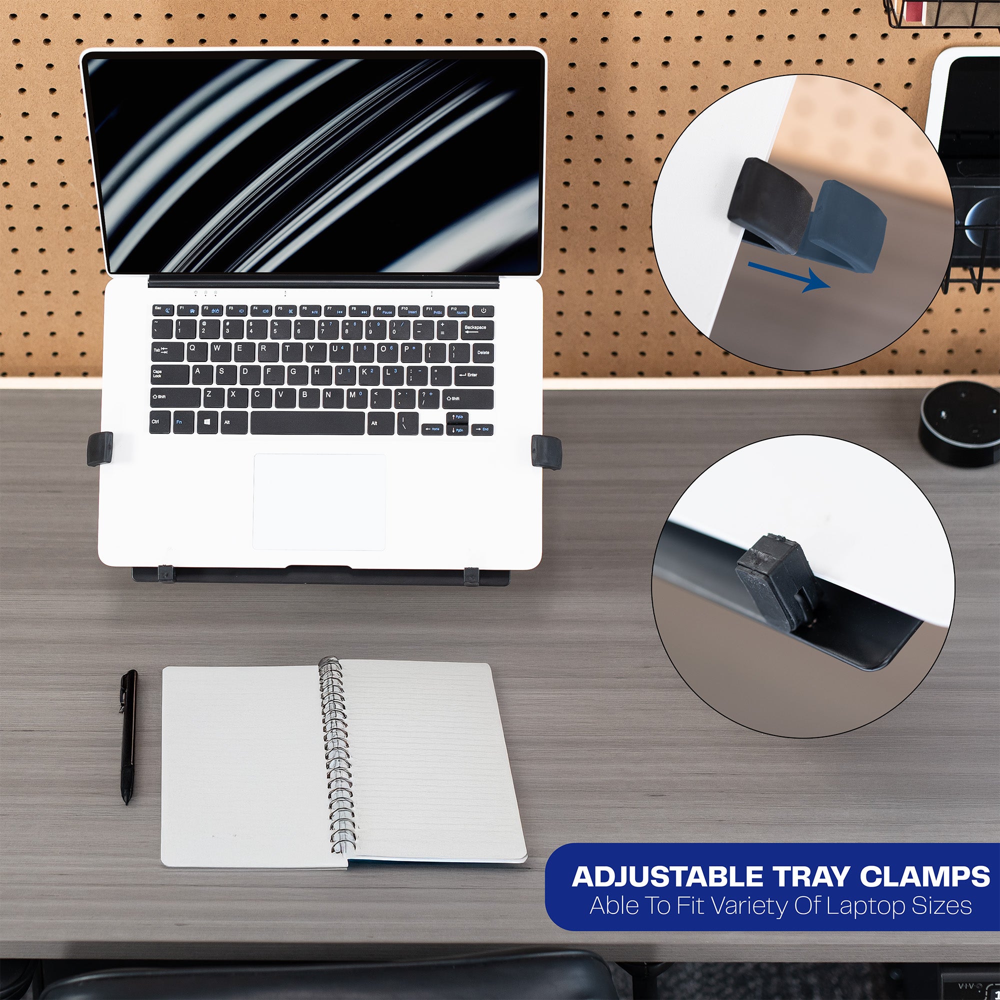 Pegboard mounted laptop tray with articulating arm. Featuring adjustable holder clamps and tray ventilation.