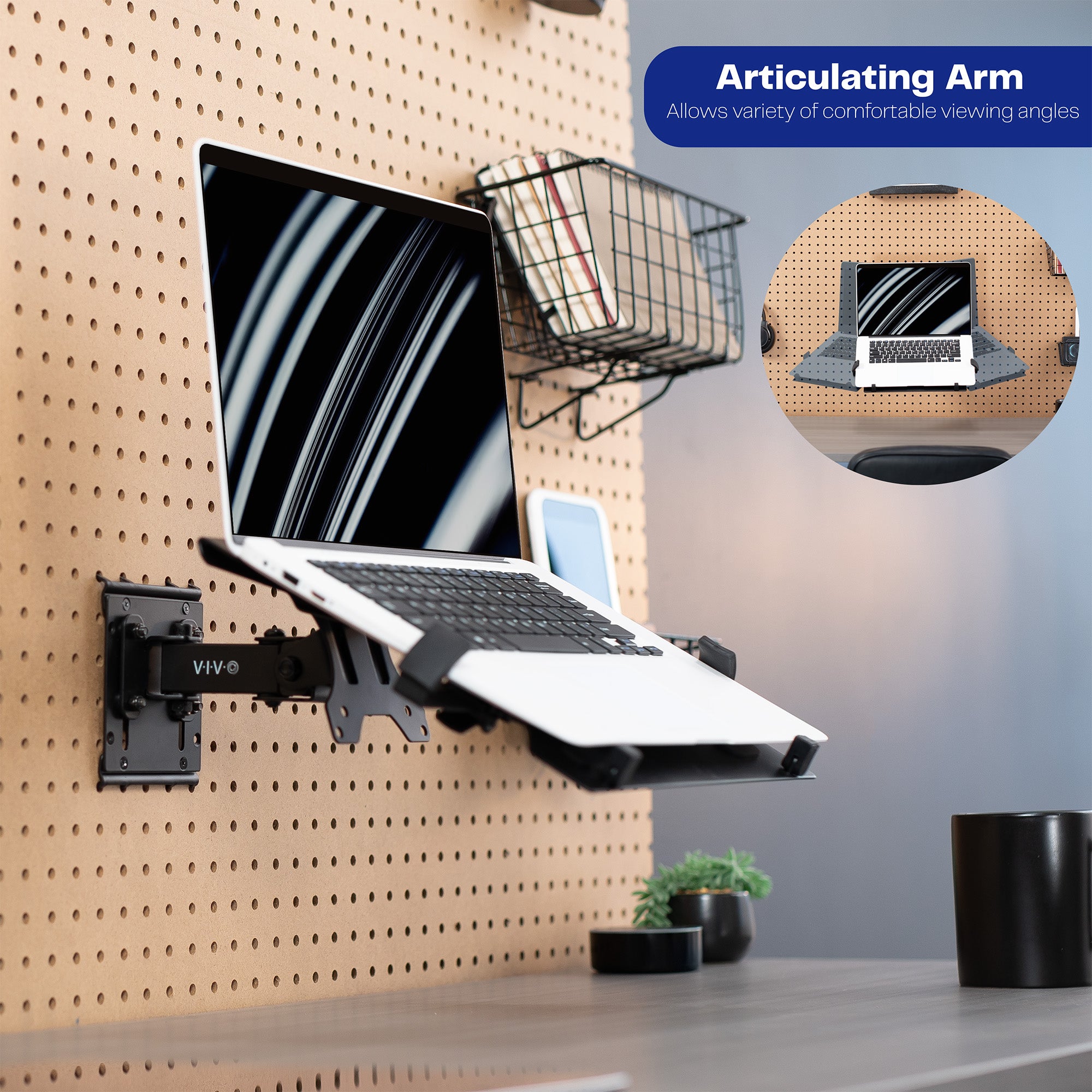 Pegboard mounted laptop tray with articulating arm. Featuring adjustable holder clamps and tray ventilation.