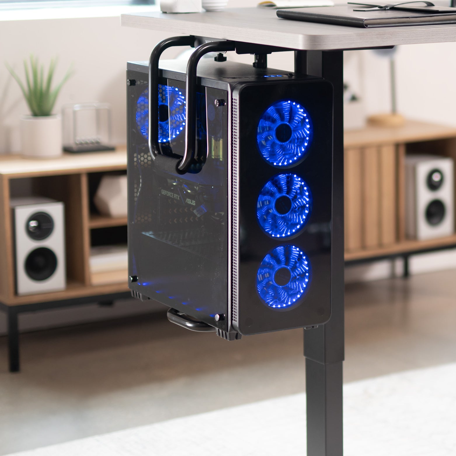 Sturdy under desk PC mount with adjustable width and height and protective padding included.