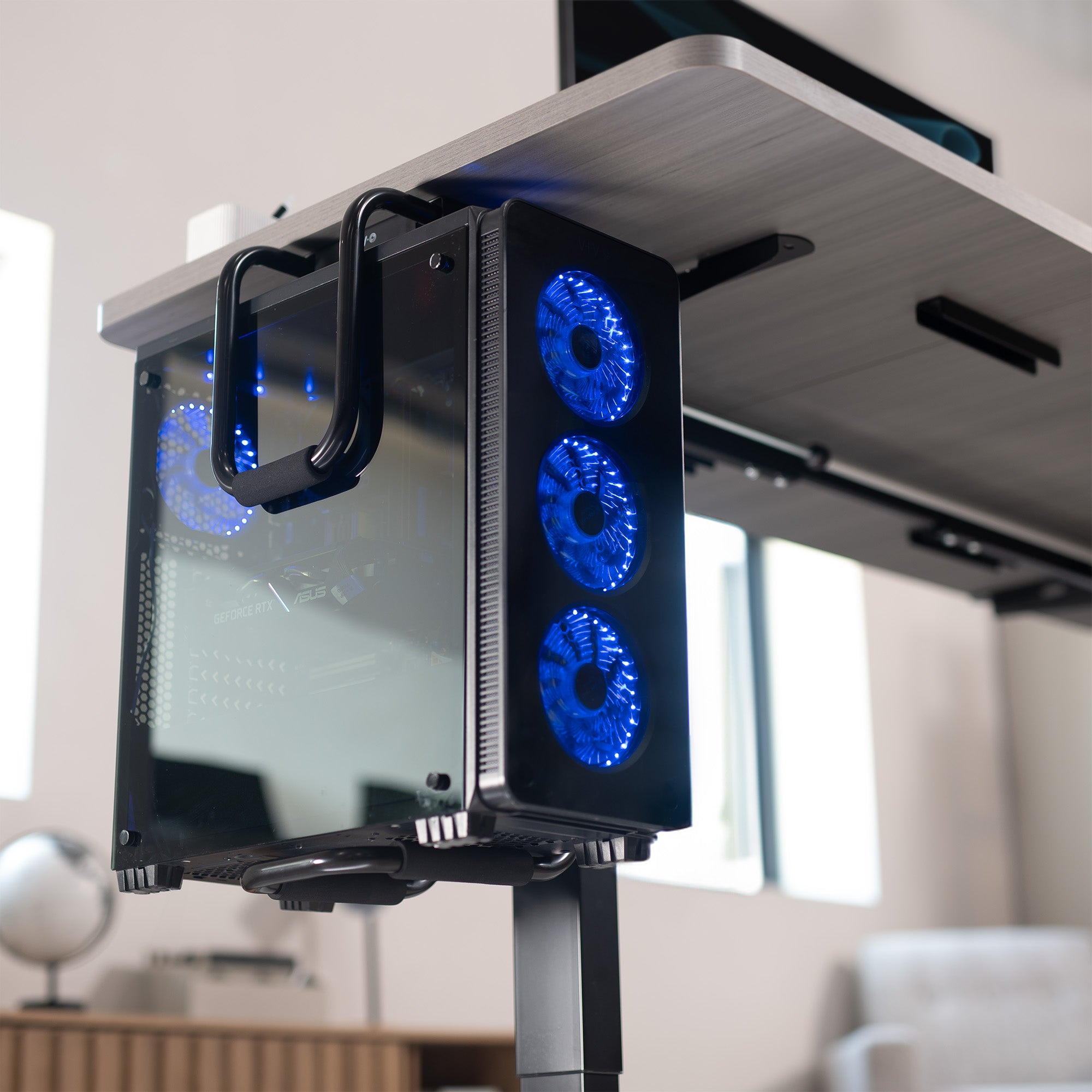 Sturdy under desk PC mount with adjustable width and height and protective padding included.