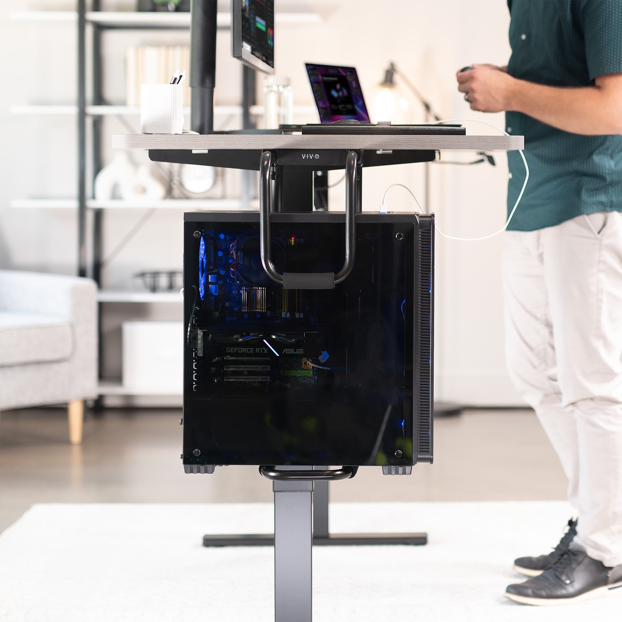 Sturdy under desk PC mount with adjustable width and height and protective padding included.