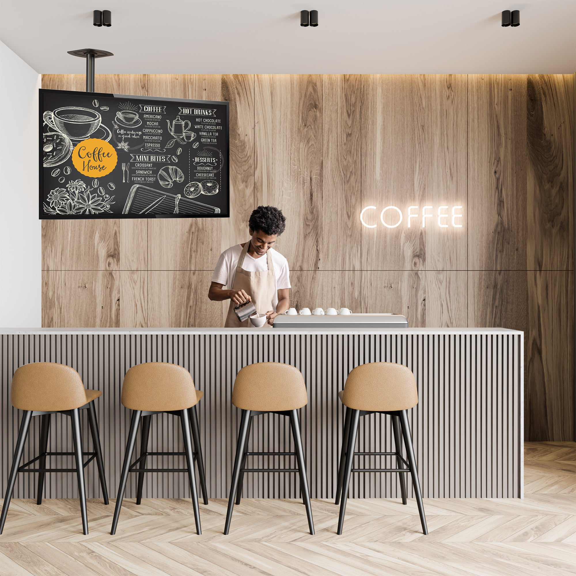 Articulating ceiling TV mount in black color in a minimalist coffee shop.