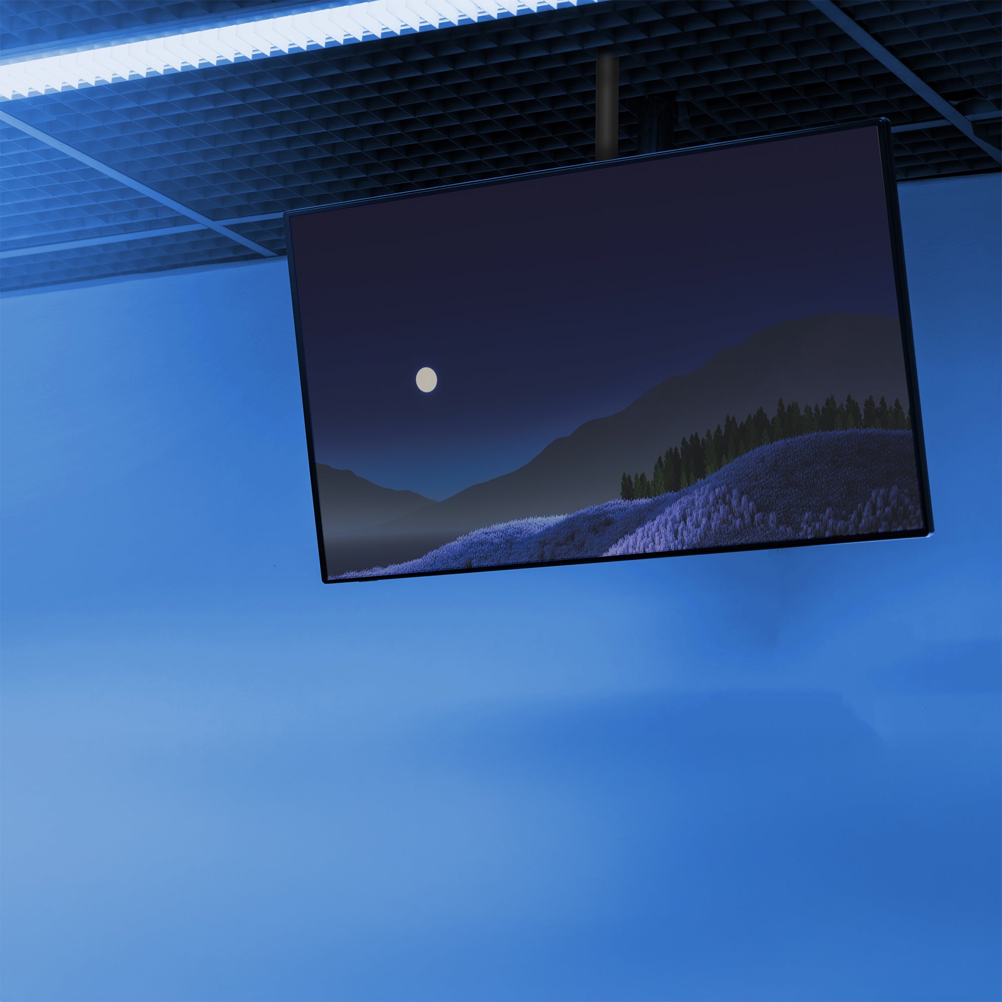Articulating ceiling TV mount in black color in a dark blue scene.