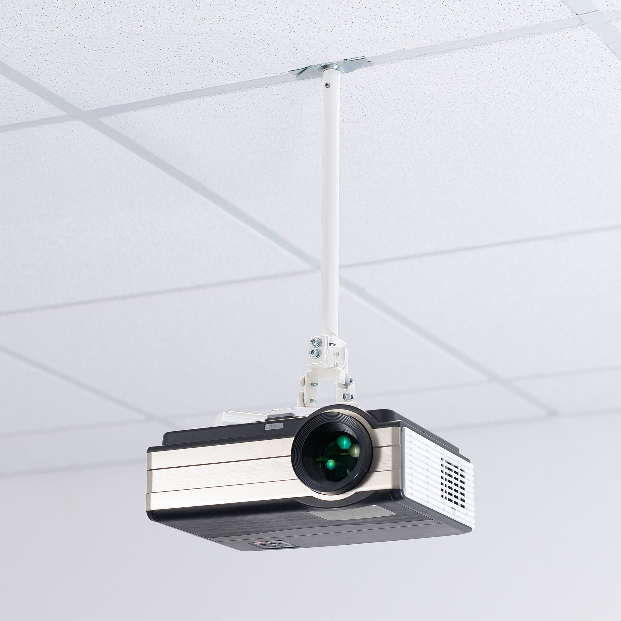 A white ceiling mount with scissor clamp designed to support projectors, featuring an adjustable length arm and a circular base.