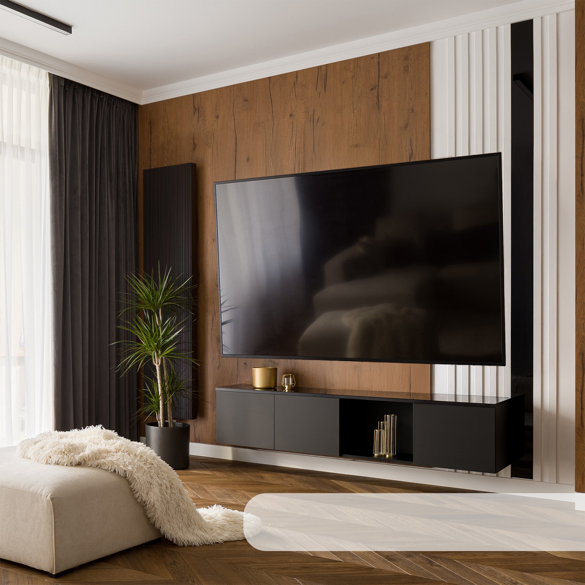 Modern living room with a large TV mounted on a wooden wall.