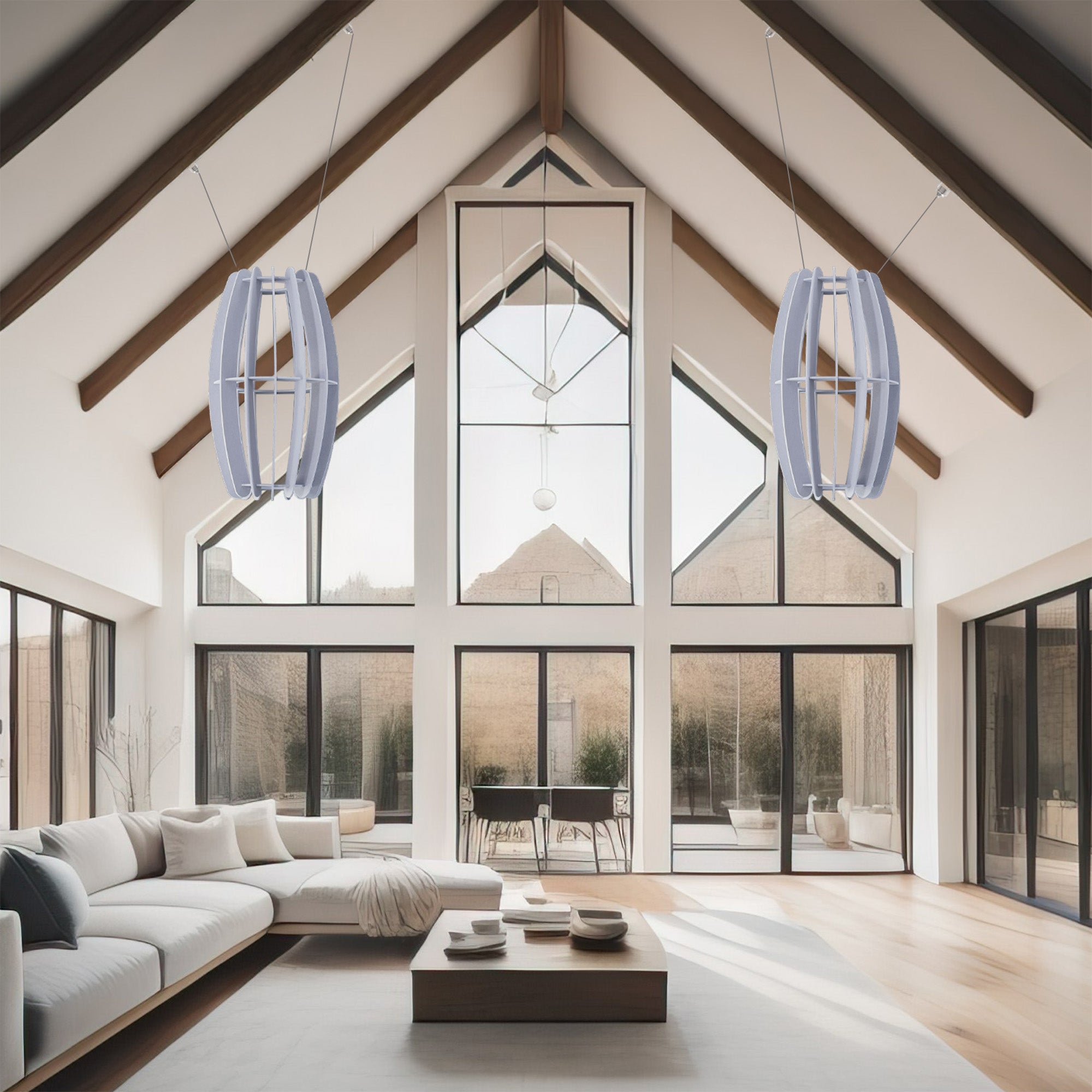 A large oval-shaped acoustic ceiling sound absorber in a light gray color in a modern living room.