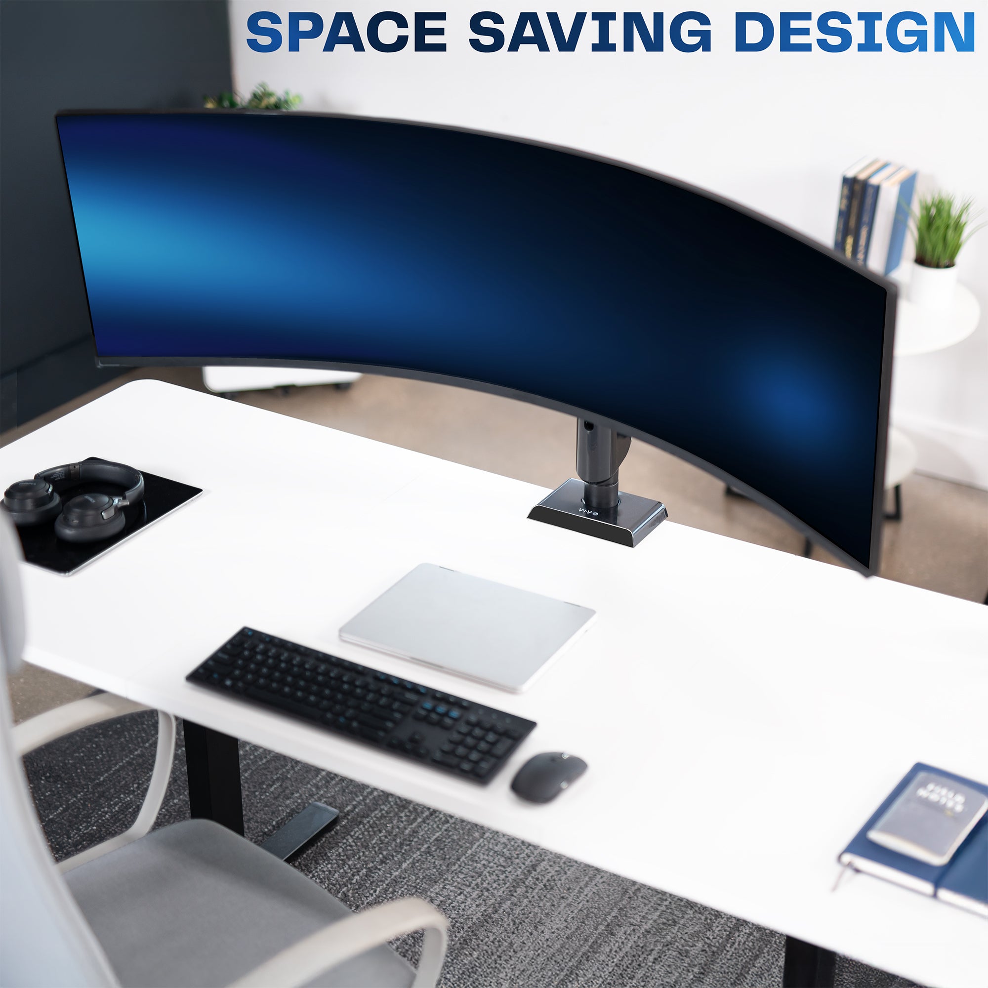 Curved monitor on a desk with space-saving design text