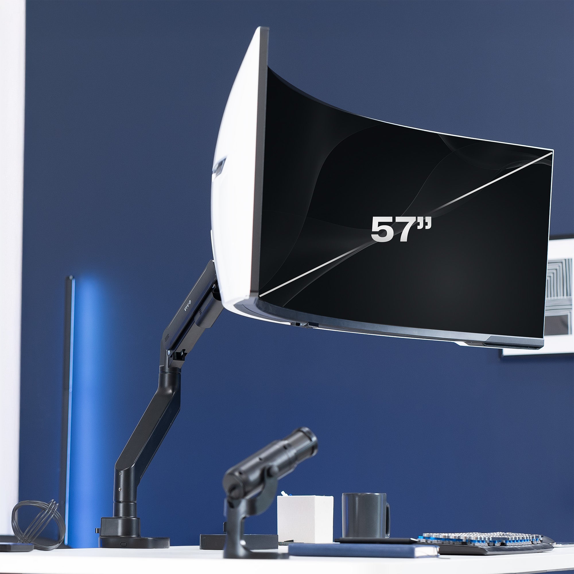 Monitor with an adjustable arm on a dark blue background.