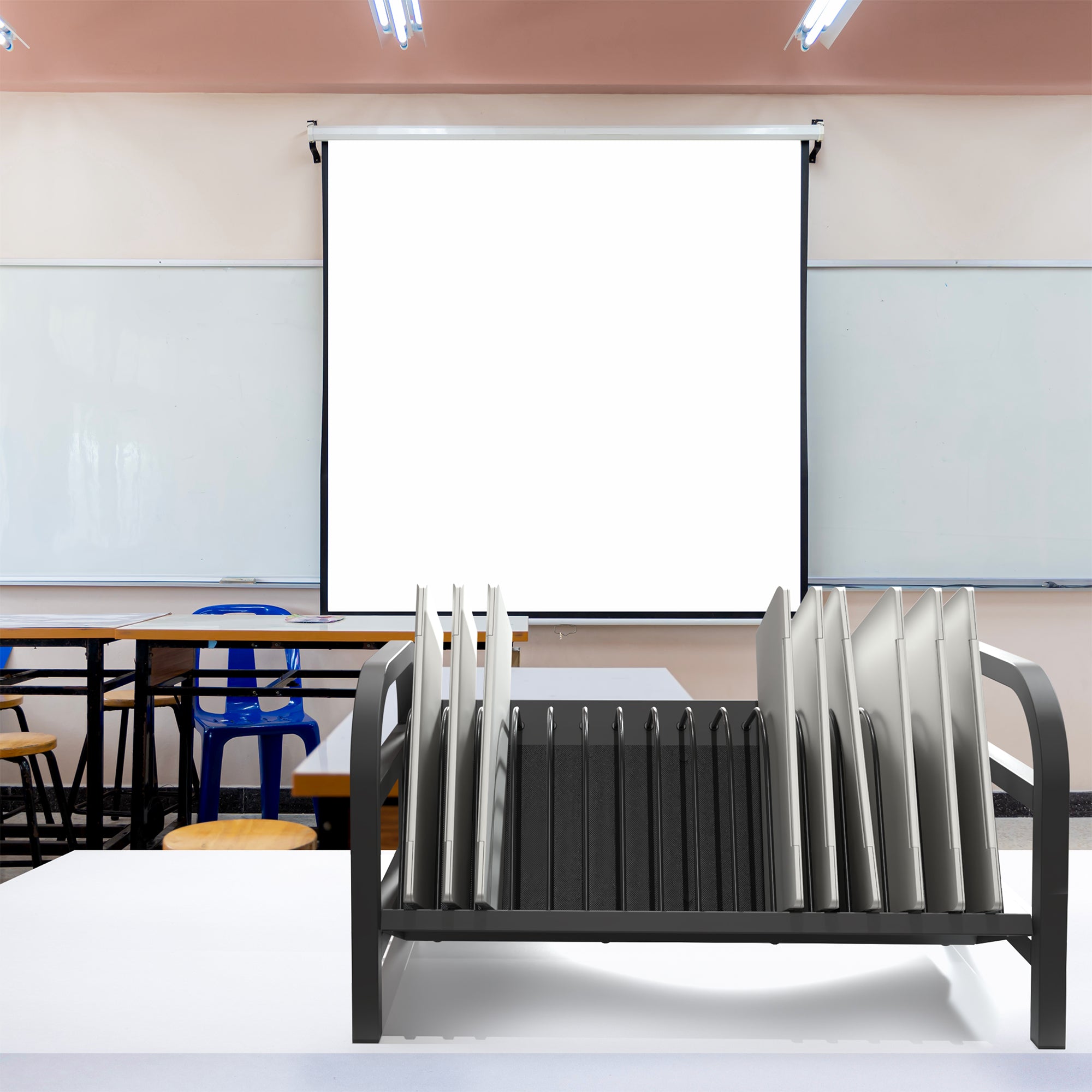 Modern classroom with whiteboards, desks, and chairs.