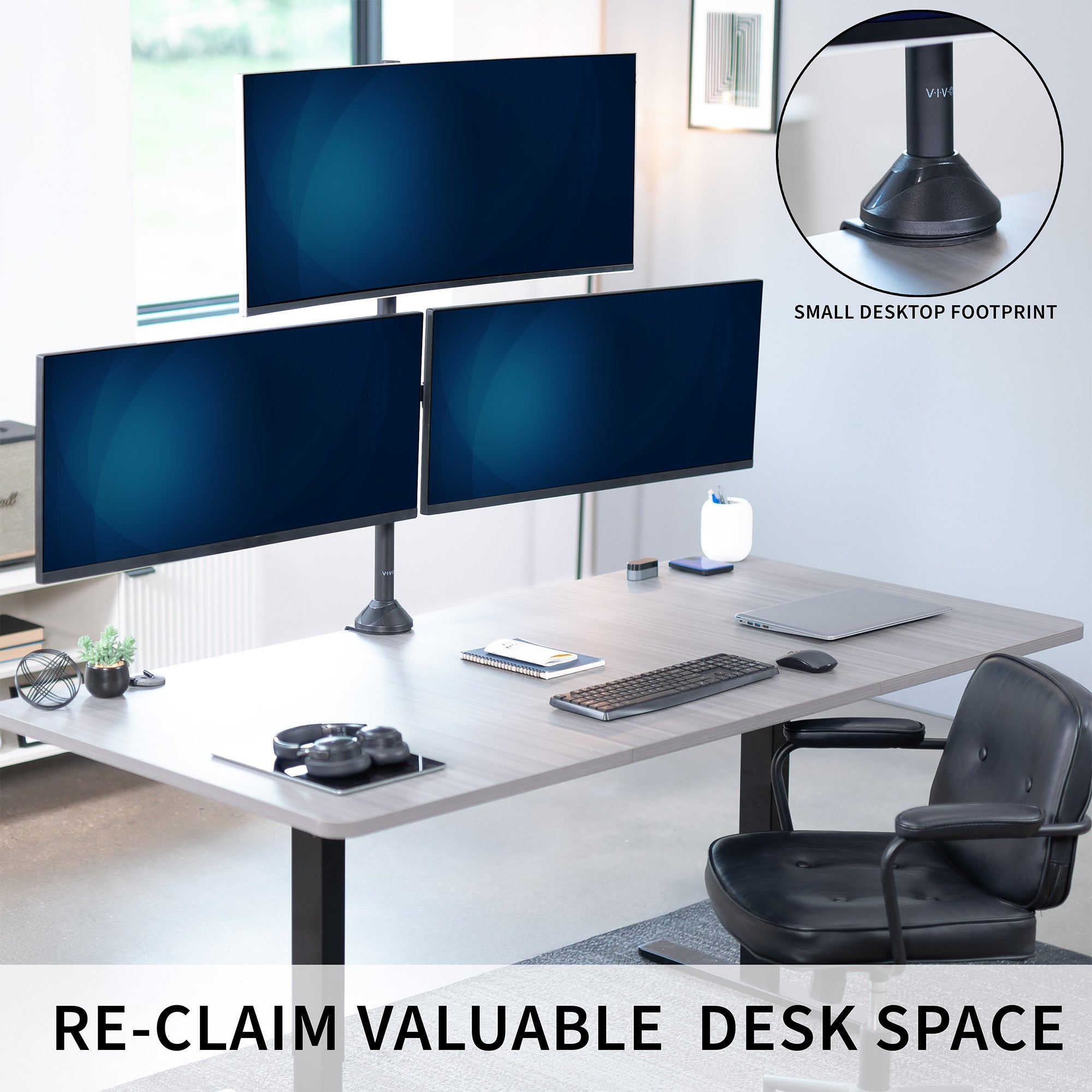 Modern office setup with multiple monitors on a desk, chair, and text.
