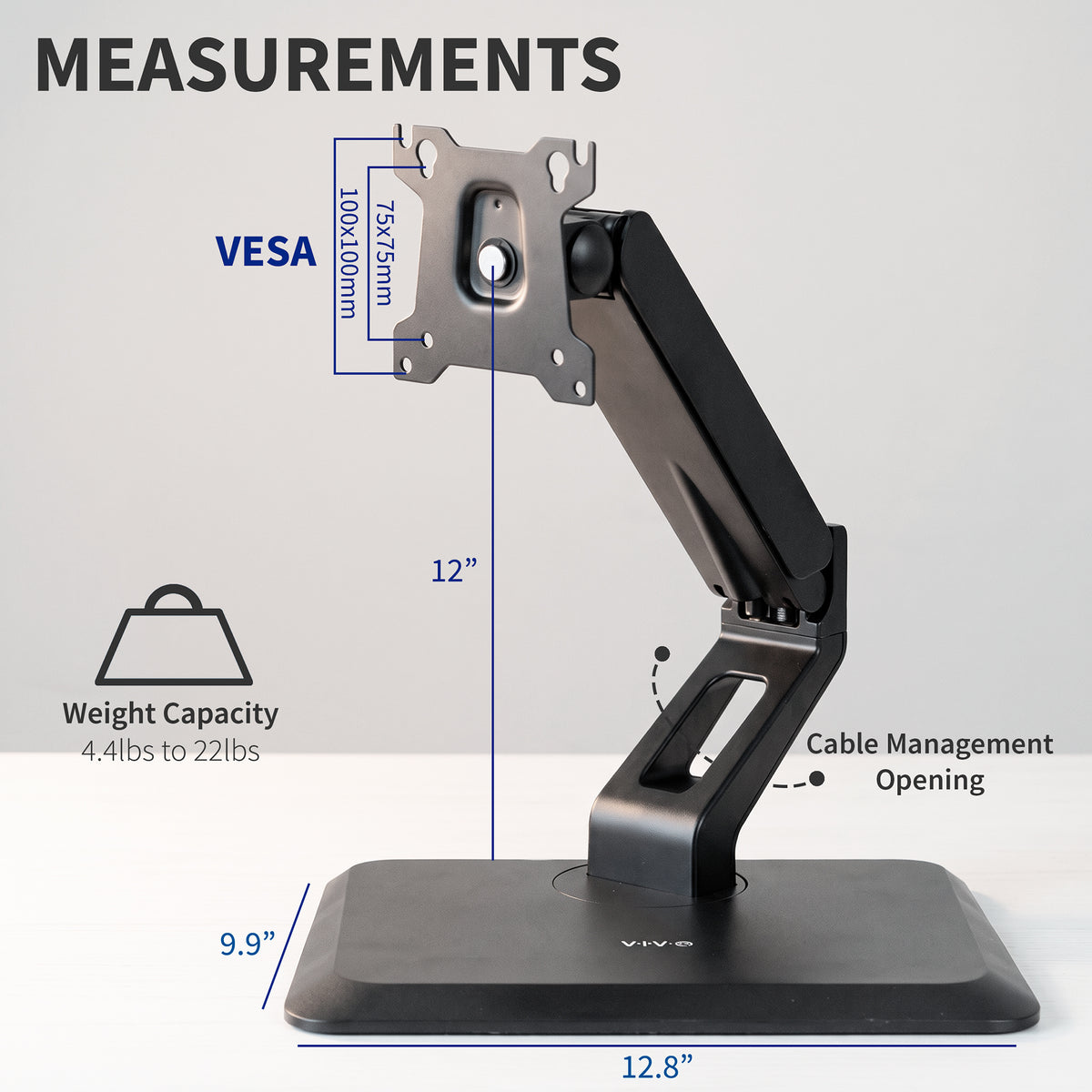Measurements of a pneumatic monitor stand shown on a white tabletop