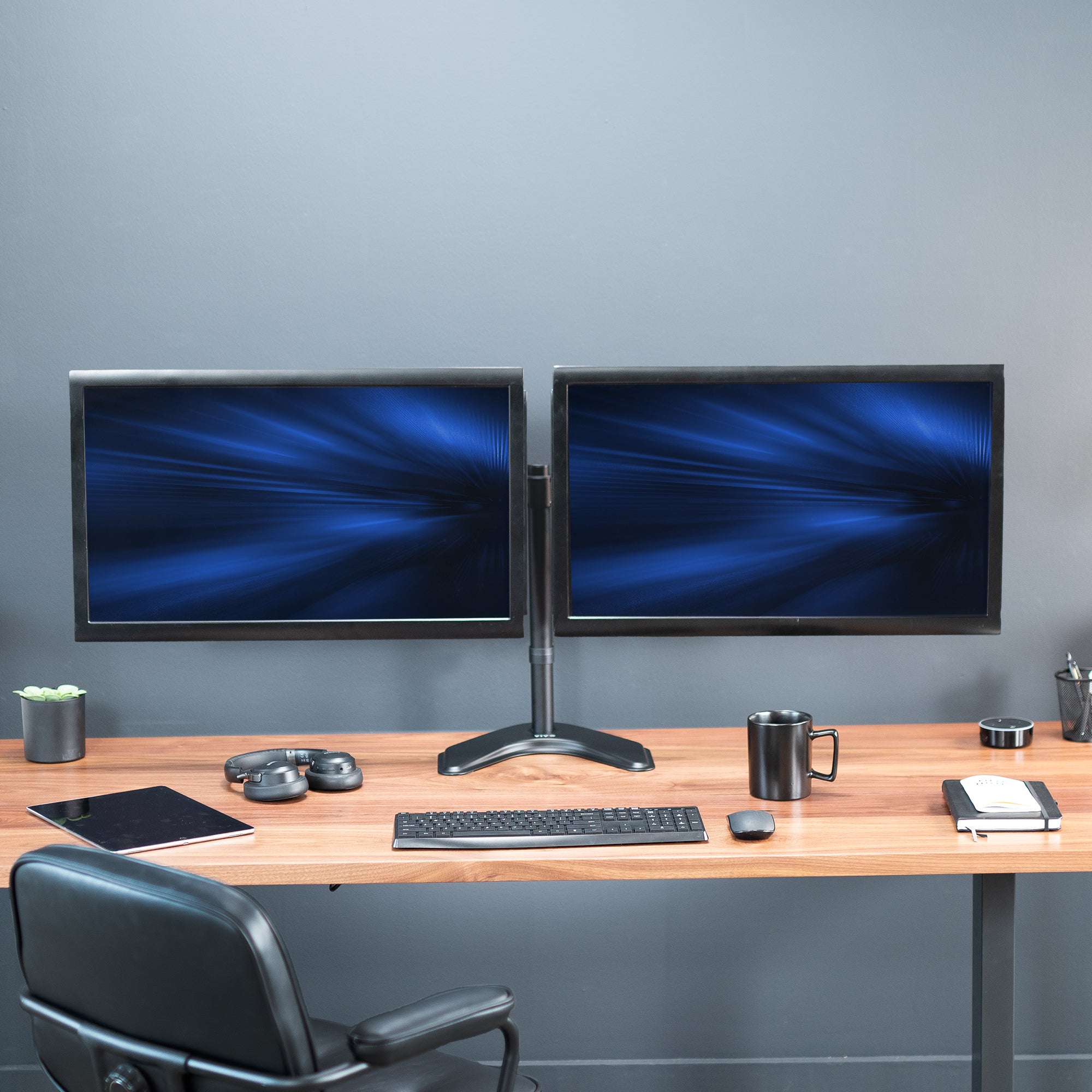 Enjoy ergonomic viewing angles with our freestanding dual monitor stand.