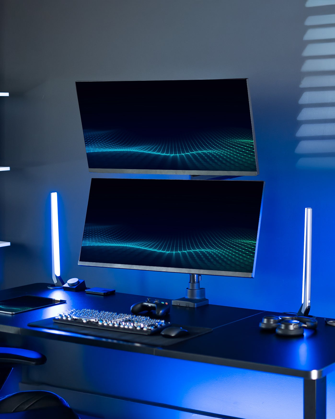 Dual monitor ultrawide desk mount with extending arms. Featuring height adjustment, tilt, swivel, rotation, and integrated cable management.