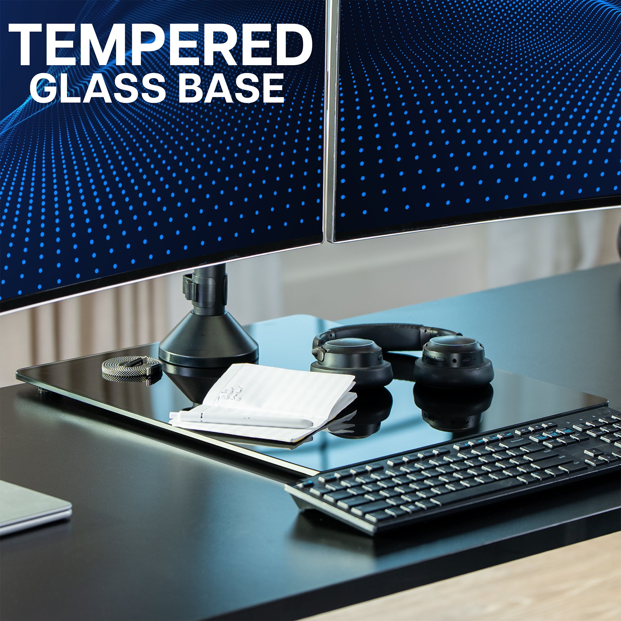 Freestanding quad monitor desk mount with tempered glass base for stable, drill-free desktop placement