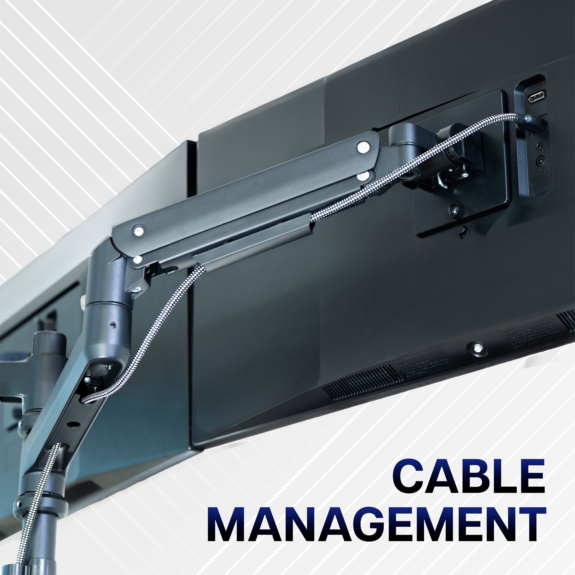 Quad ultrawide monitor mount with integrated cable management for organized cords and a clutter-free workstation