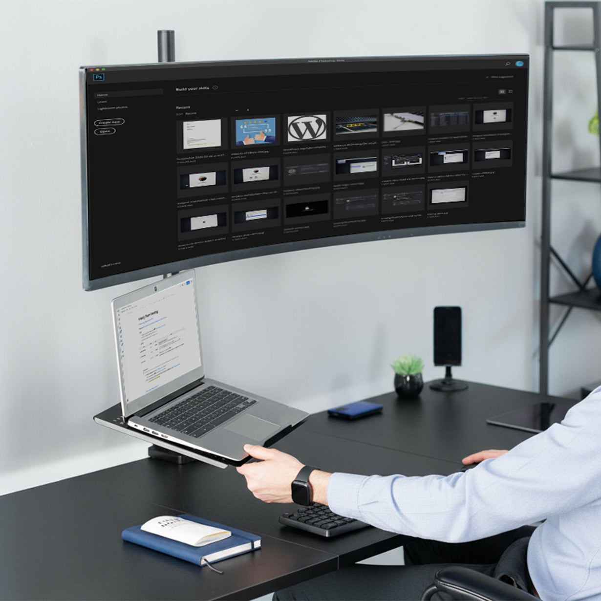 Ultrawide Monitor and Laptop Extra Tall Vertical Desk Mount on desk in office space