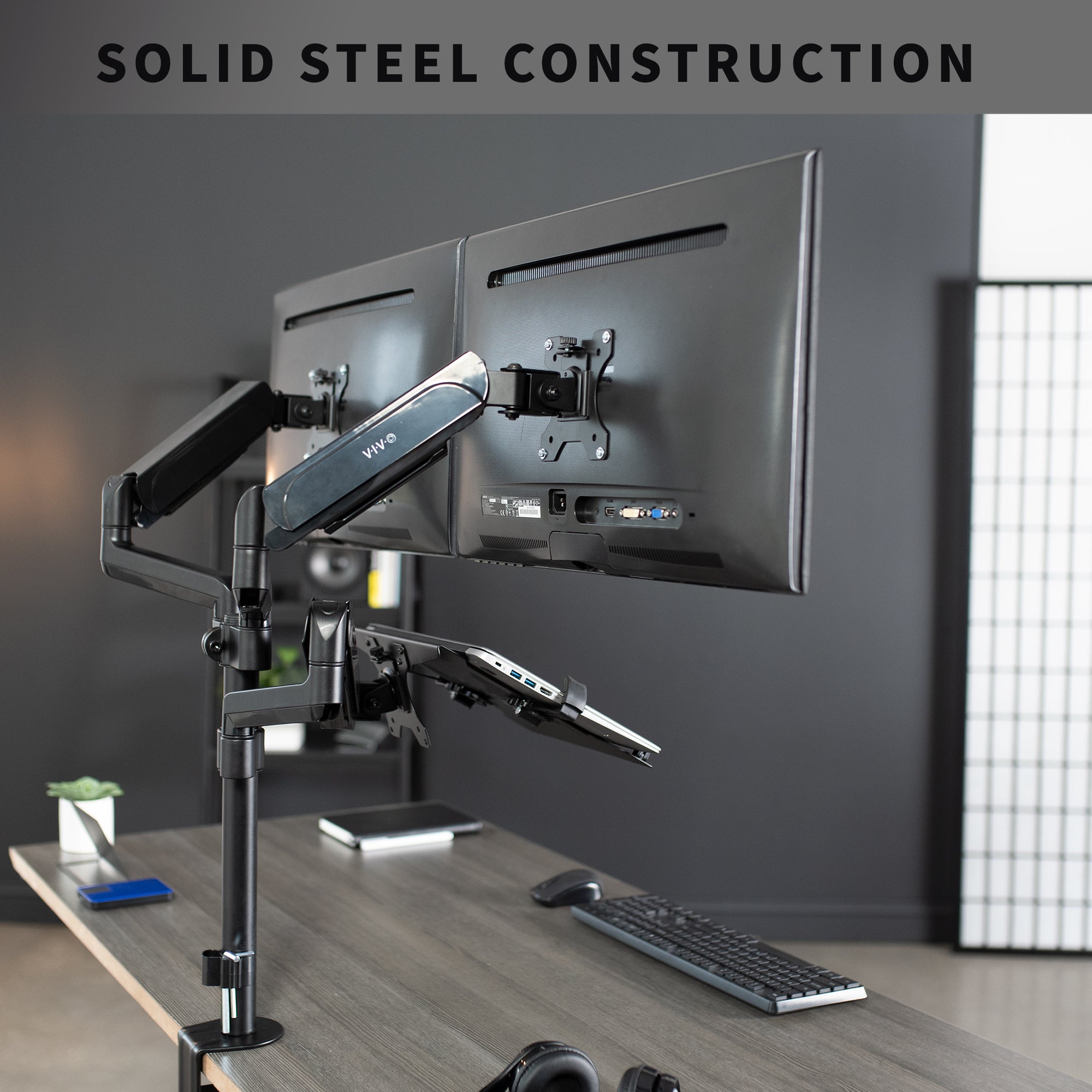 Pneumatic arm dual monitor and laptop desk mount that elevates your screens to a comfortable viewing height.
