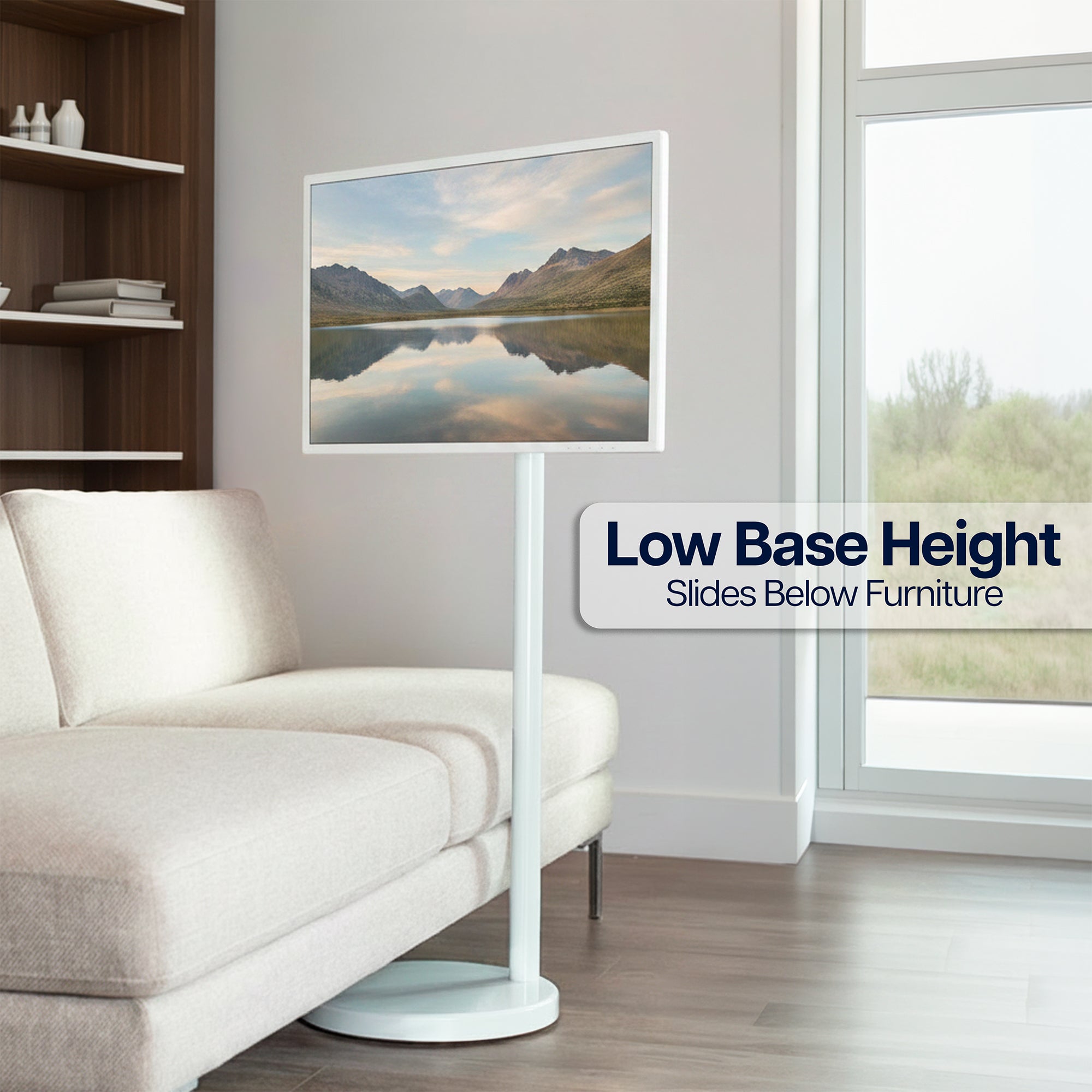 White mobile TV cart with low-profile base designed to fit beneath furniture for space-saving placement