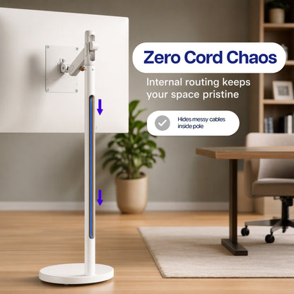 A white monitor / TV stand with a circular base and articulated arm shown in a home office setting. The image includes text overlays that read 'Zero Cord Chaos' and 'Internal routing keeps your space pristine,' along with blue arrows indicating cable routing inside the stand.