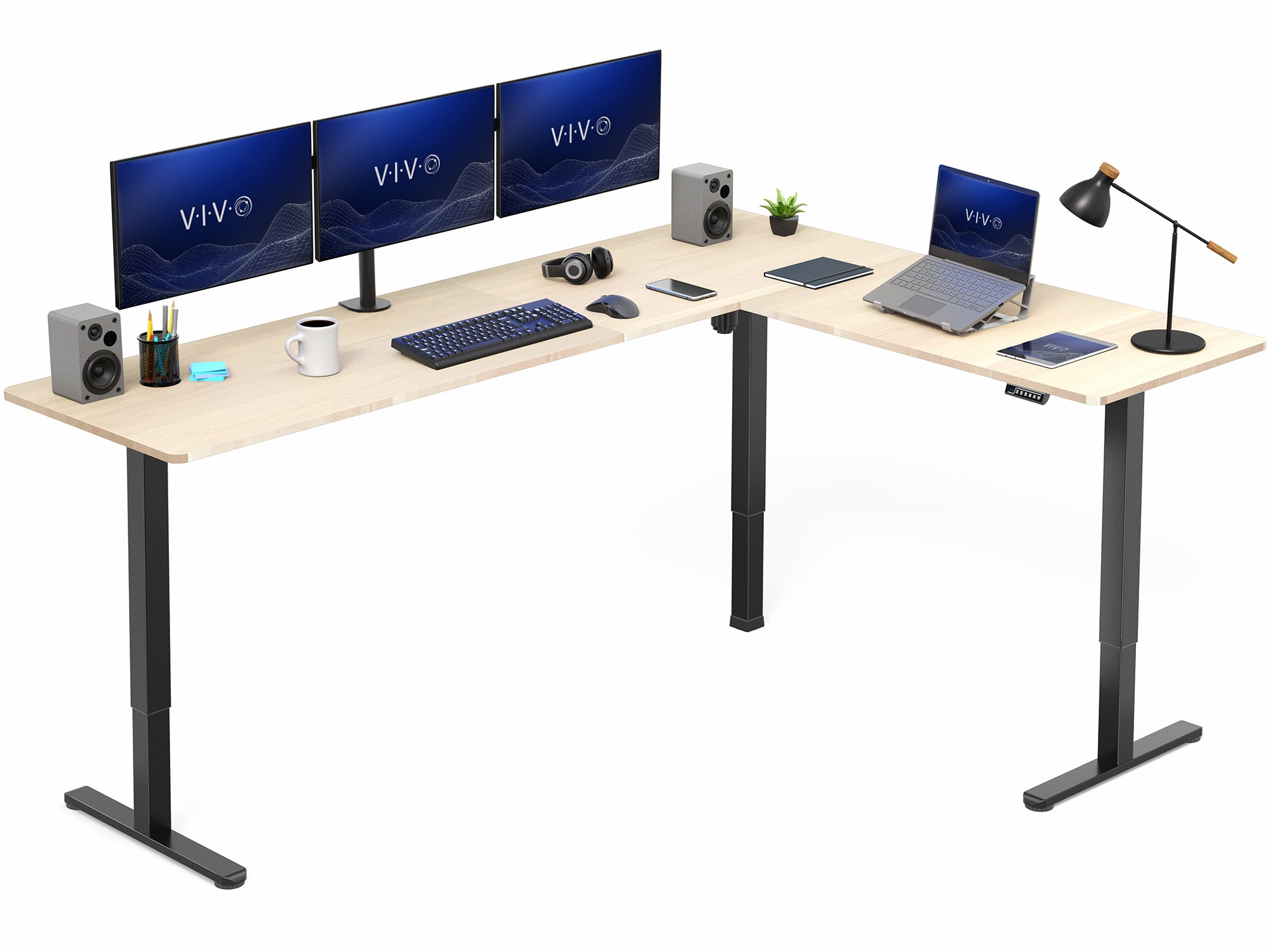 L-shaped desk with computer setup including monitors, keyboard, and laptop on a white background