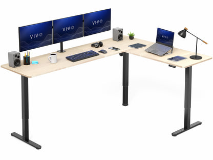 L-shaped desk with computer setup including monitors, keyboard, and laptop on a white background