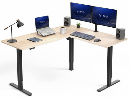 L-shaped desk with computer setup including monitors, keyboard, and speakers on a white background