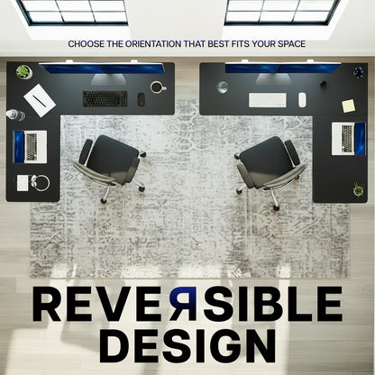 Two office desks with reversible design feature on a light wood floor.