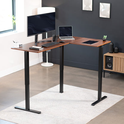 Electric heavy-duty corner desk workstation for modern office workspaces.