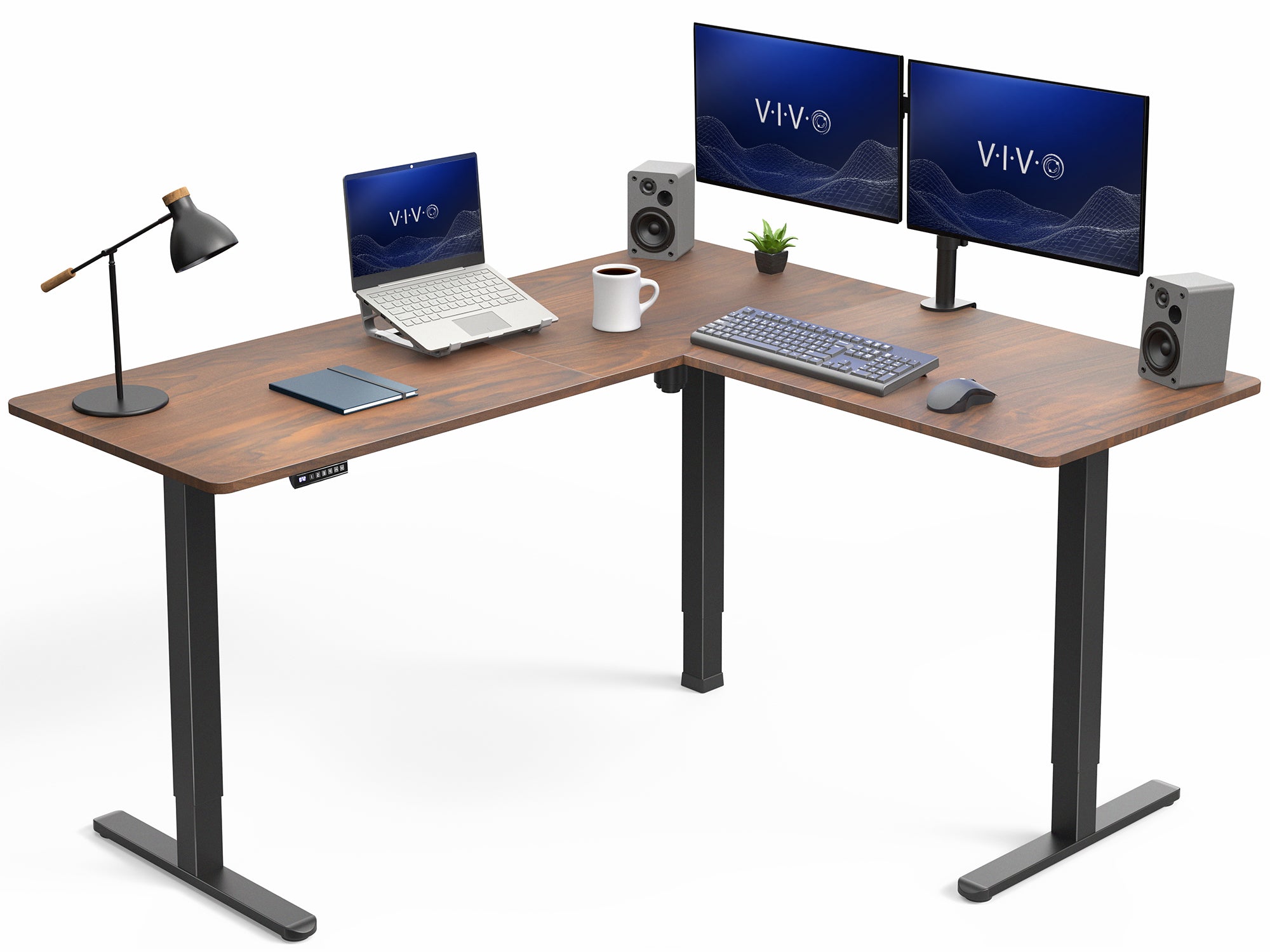 Wooden L-shaped desk with computer setup including monitors, keyboard, and speakers on a white background.