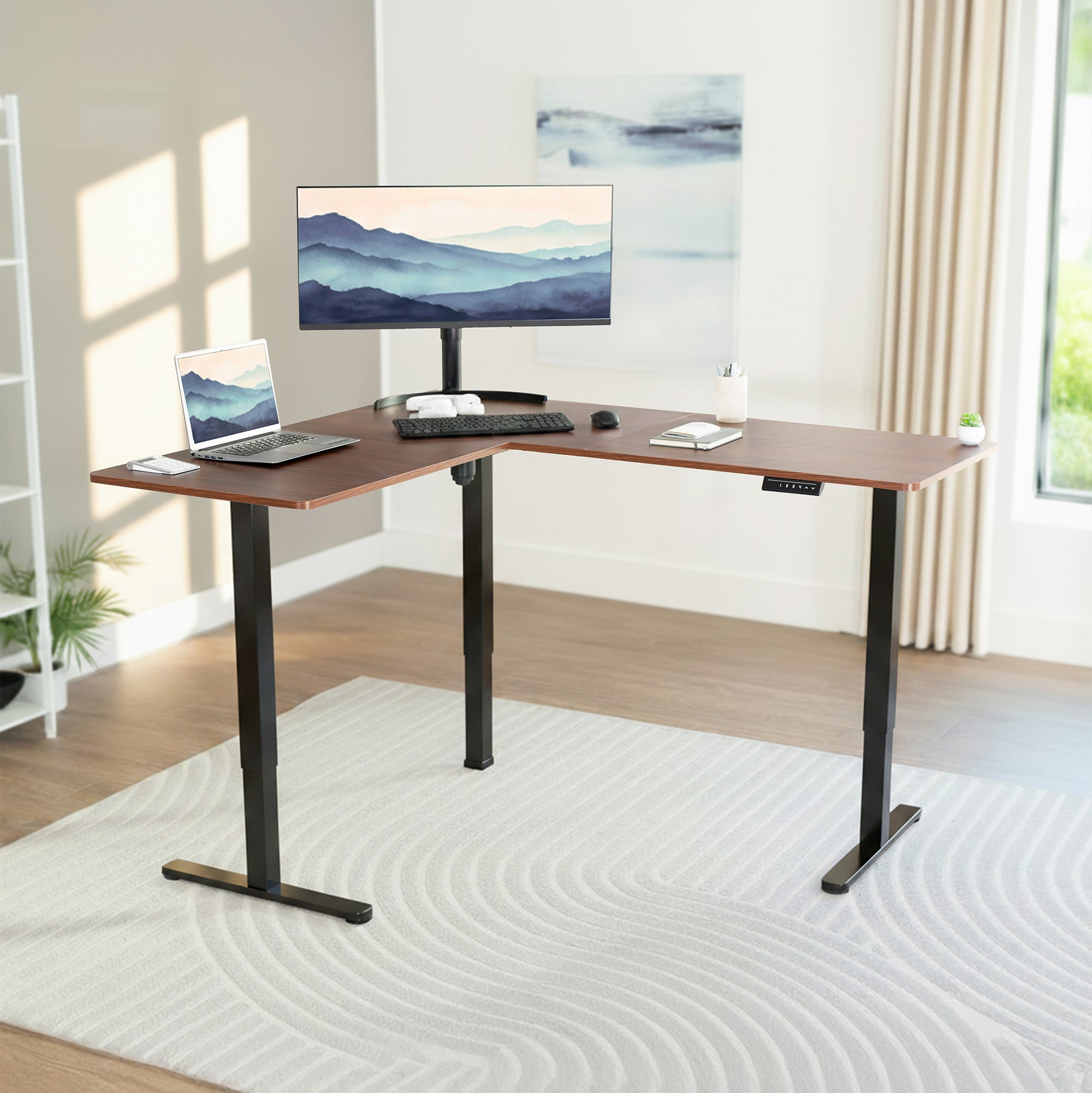 L-shaped desk with computer setup in a home office setting
